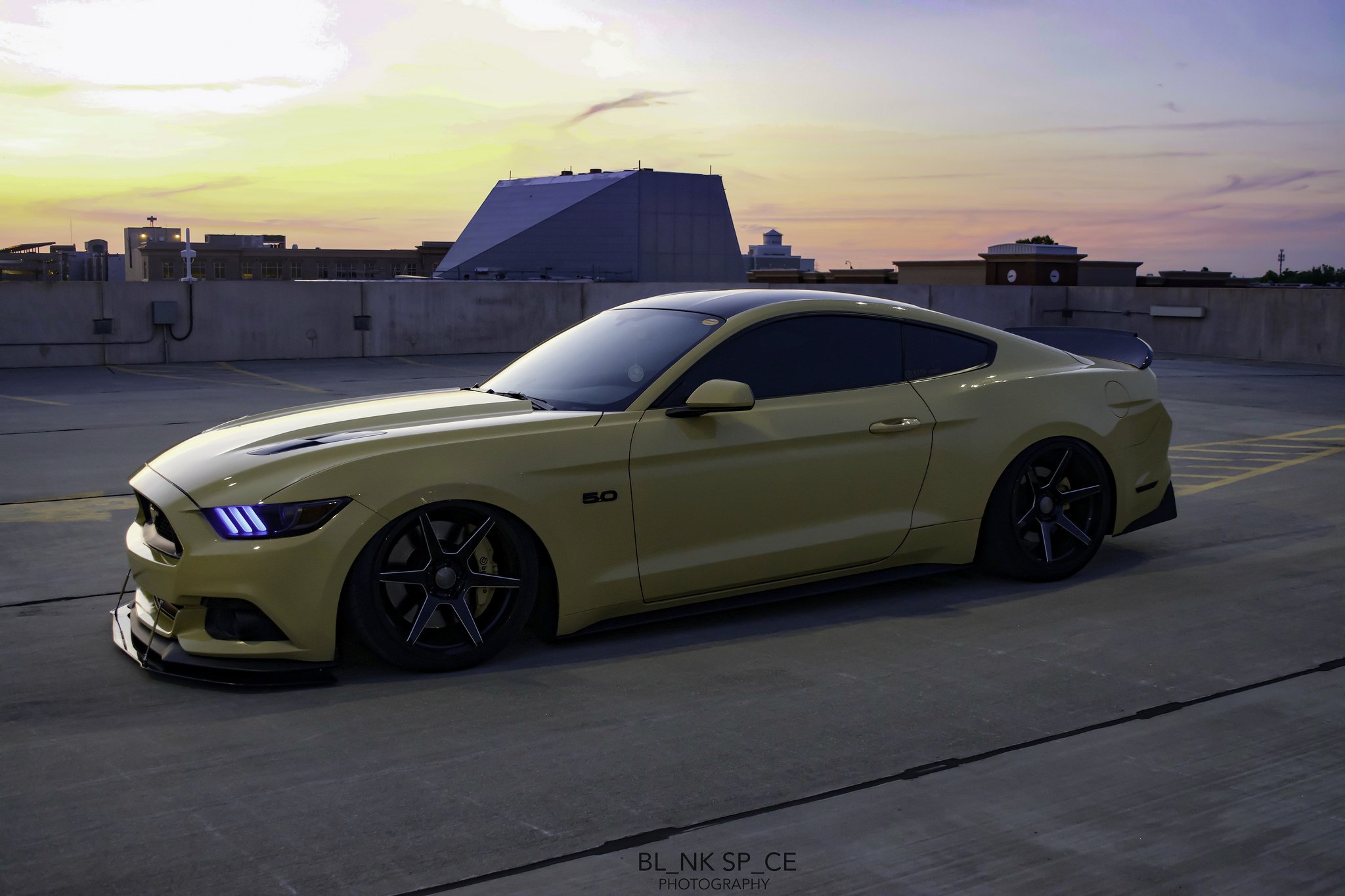Aftermarket Side Skirts on Yellow Ford Mustang 5.0 - Photo by Ace Alloy