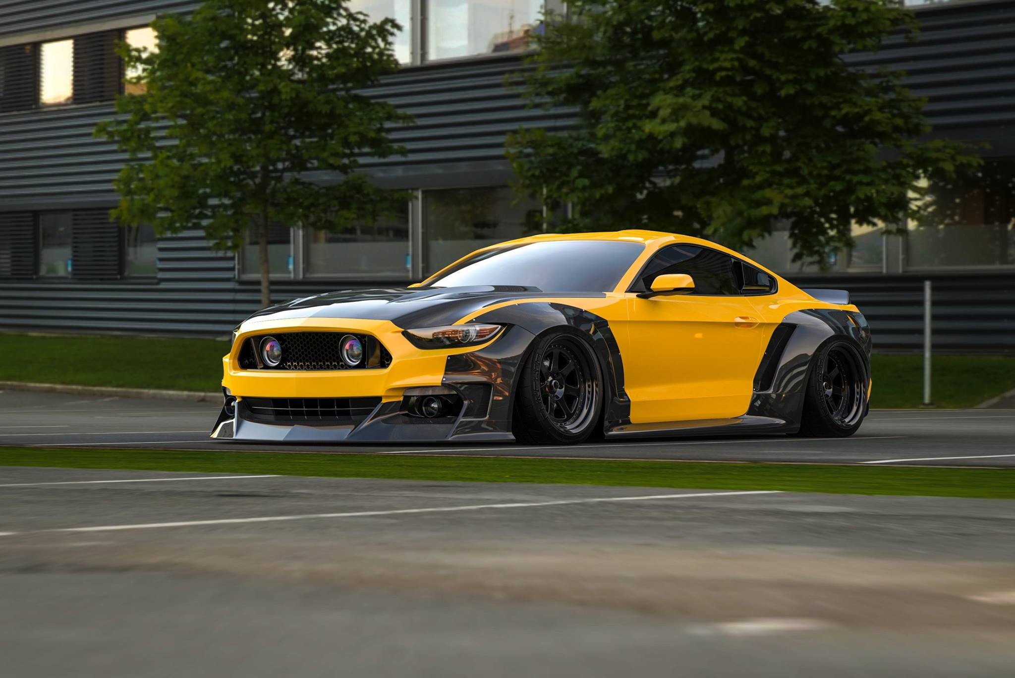 Wide Black Fender Flares on Yellow Ford Mustang - Photo by Clinched