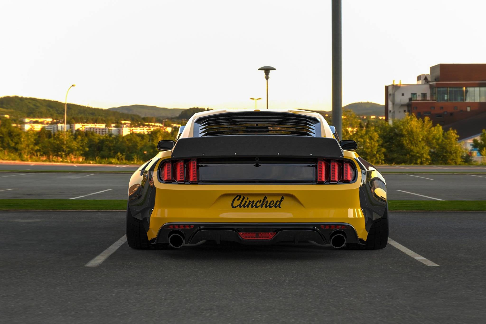 Yellow Ford Mustang with Aftermarket Rear Diffuser - Photo by Clinched