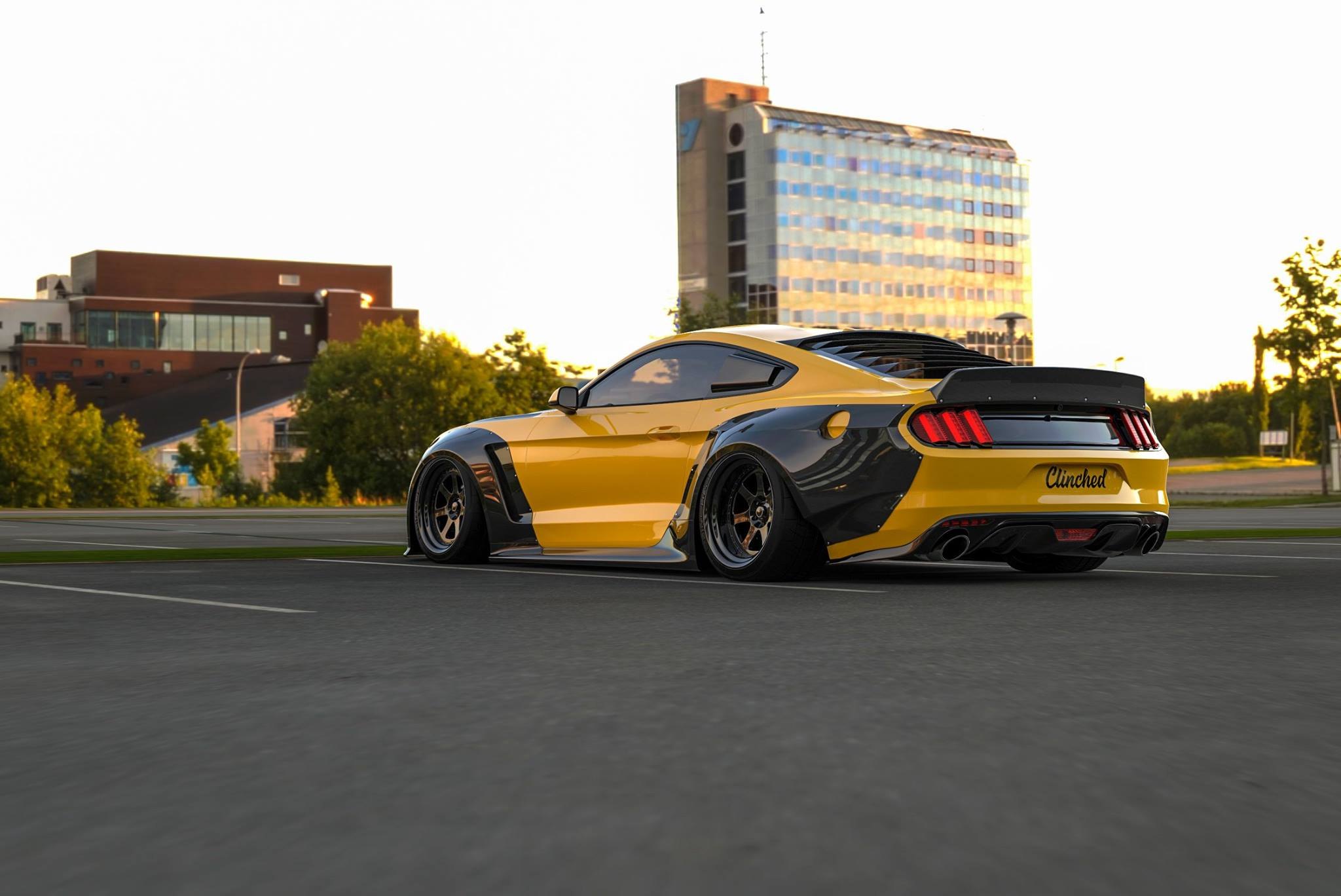 Custom Black Wheels on Yellow Ford Mustang - Photo by Clinched