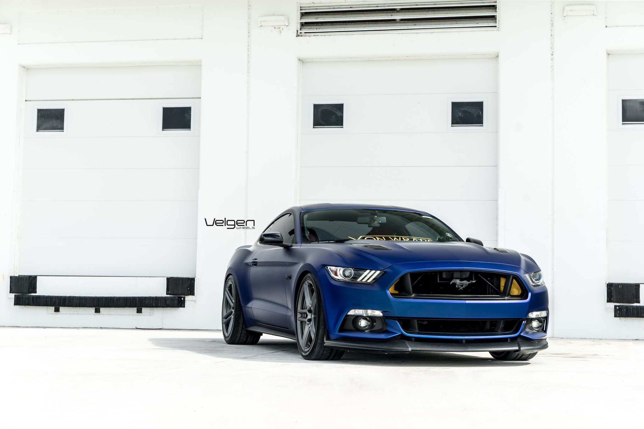 Blue Ford Mustang with Custom Front Lip - Photo by Velgen