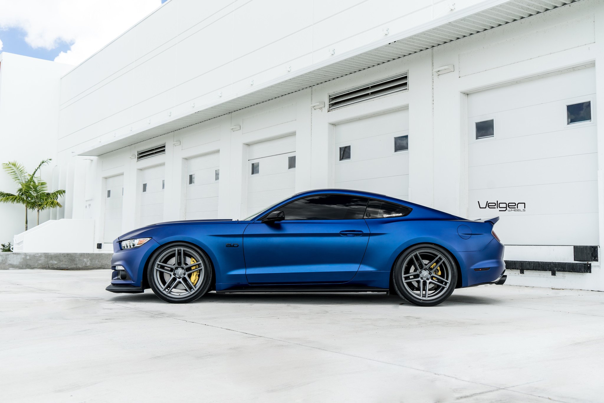 Blue Ford Mustang 5.0 with Aftermarket Side Skirts - Photo by Velgen