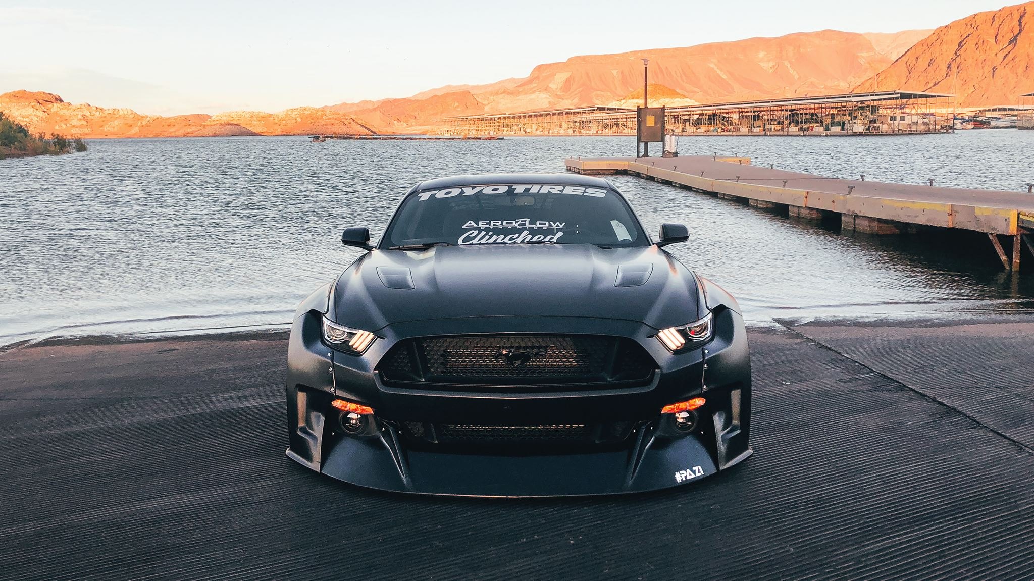 Aftermarket Headlights on Black Ford Mustang GT - Photo by Clinched