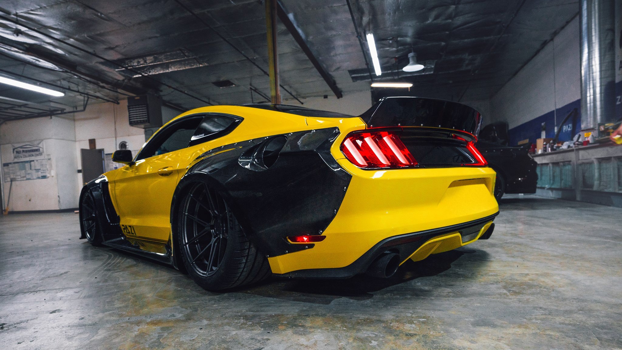 Carbon Fiber Fender Flares on Yellow Ford Mustang - Photo by Clinched