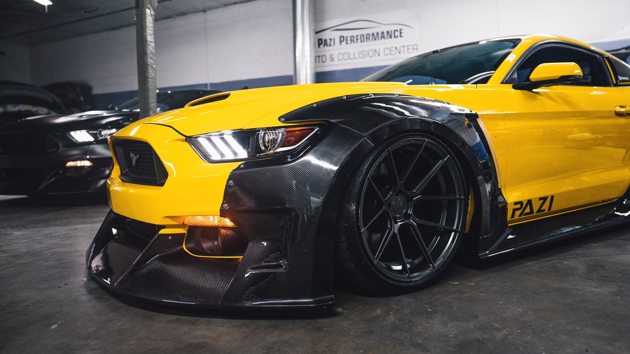 Yellow Ford Mustang with Custom Black Wheels - Photo by Clinched