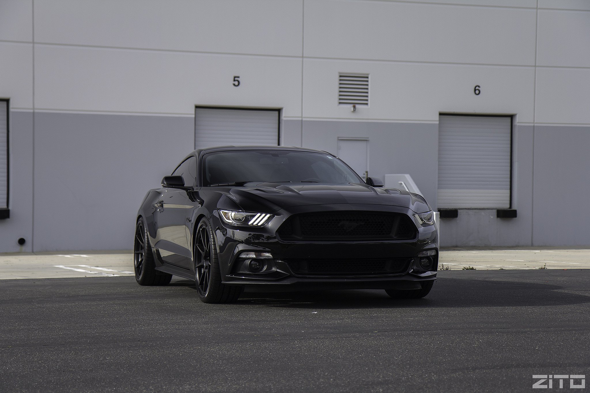 Front Bumper with Fog Lights on Black Ford Mustang - Photo by Zito Wheels