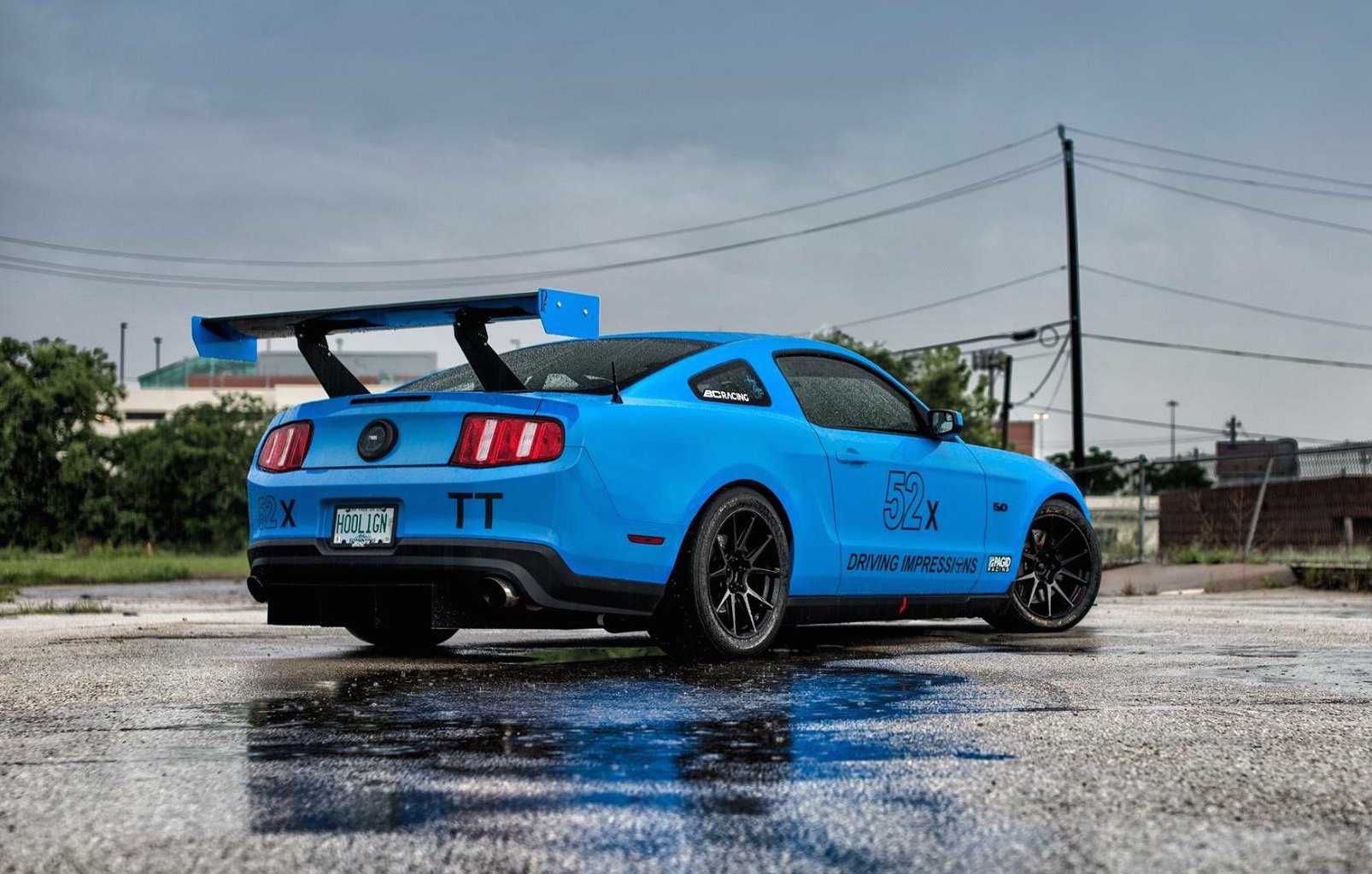 Large Wing Spoiler on Blue Ford Mustang 5.0 - Photo by Forgeline Motorsports