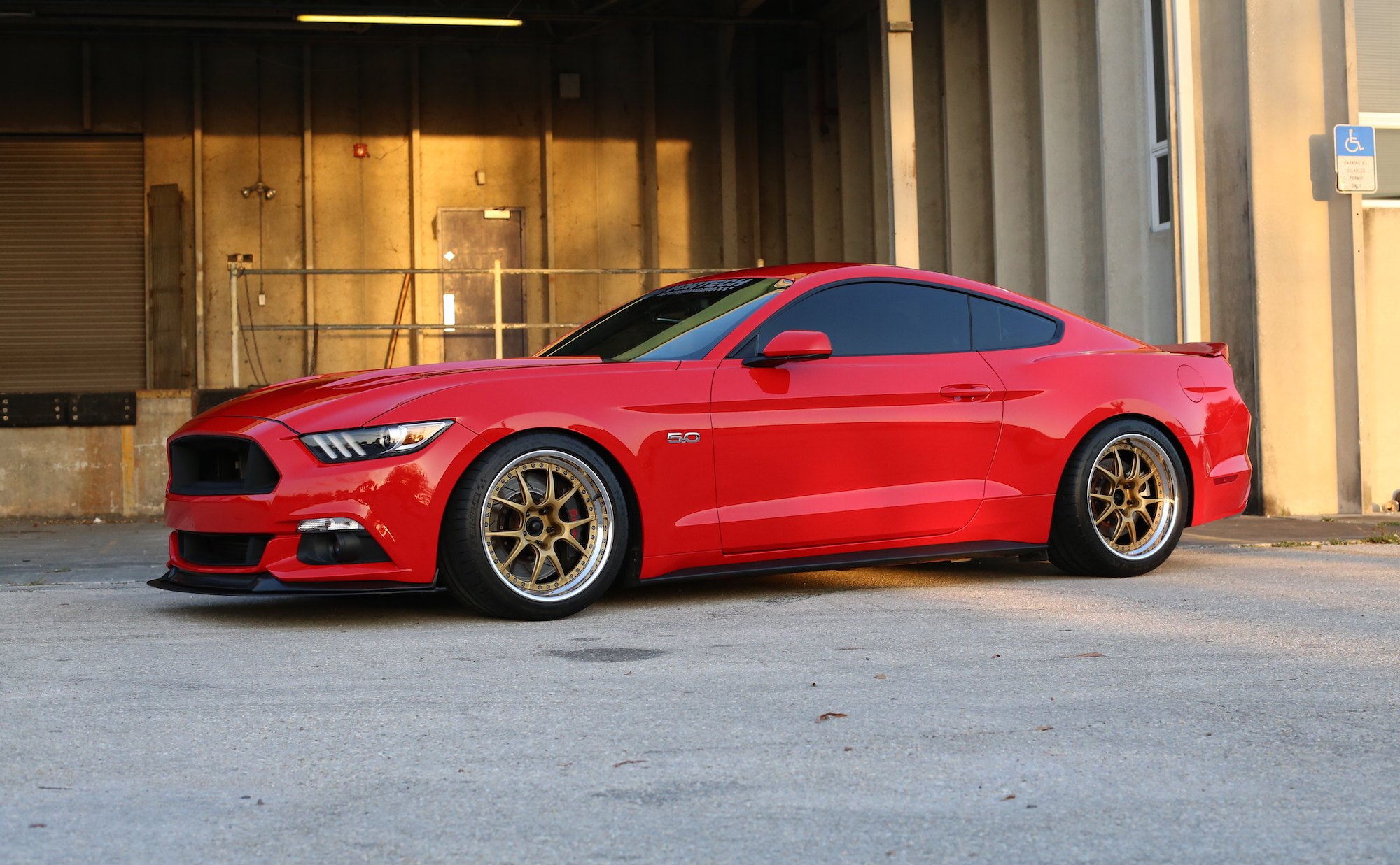 Custom Red Ford Mustang 5.0 with Michelin Tires - Photo by Forgeline Motorsports