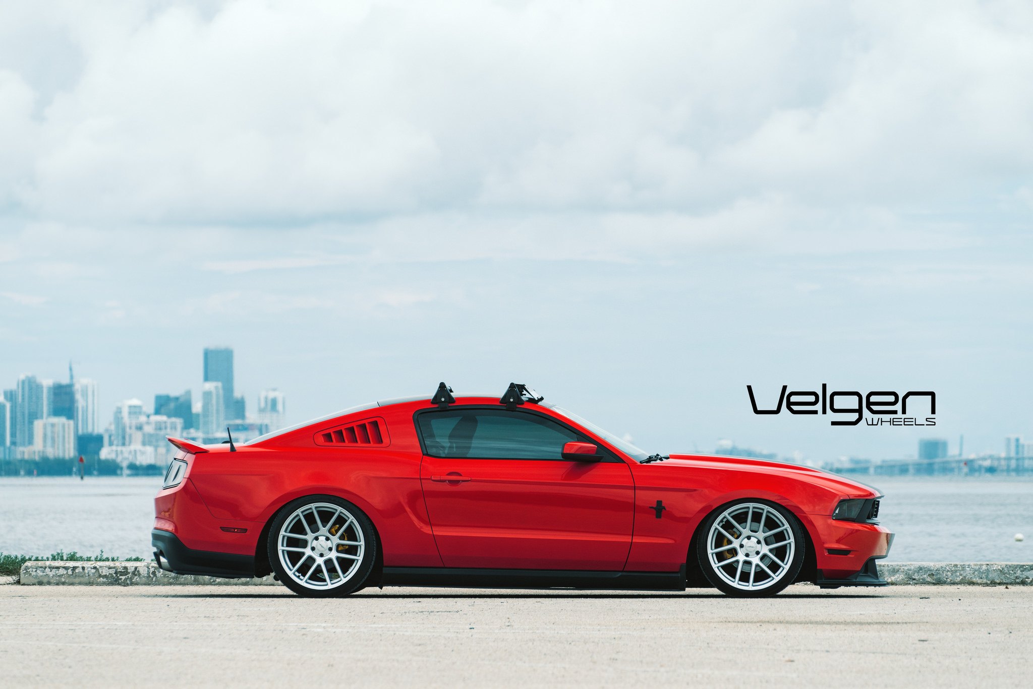 Lowered Ford Mustang with a Roof Rack - Photo by Velgen
