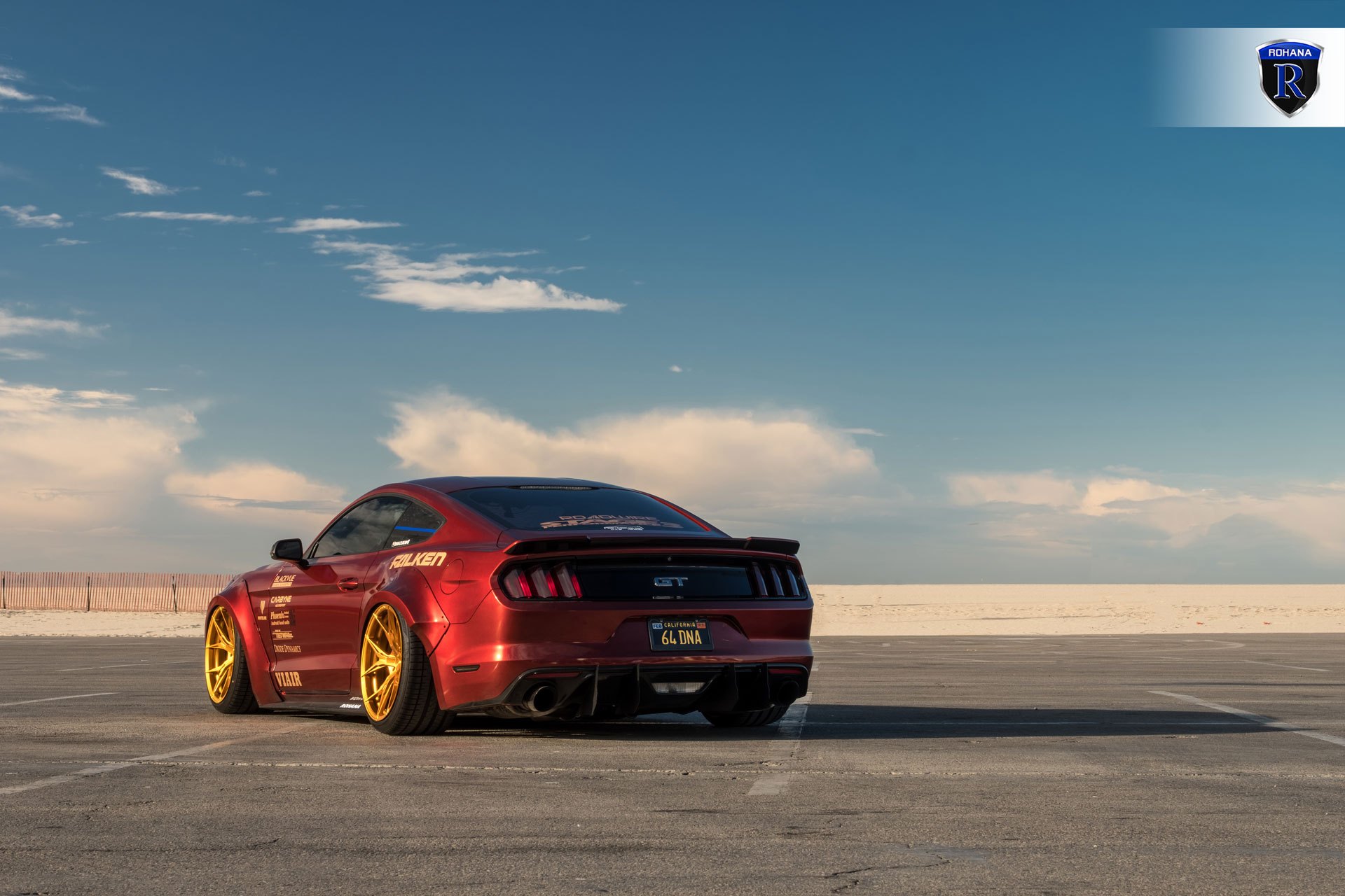 Aftermarket Rear Spoiler on Red Debadged Ford Mustang - Photo by Rohana Wheels