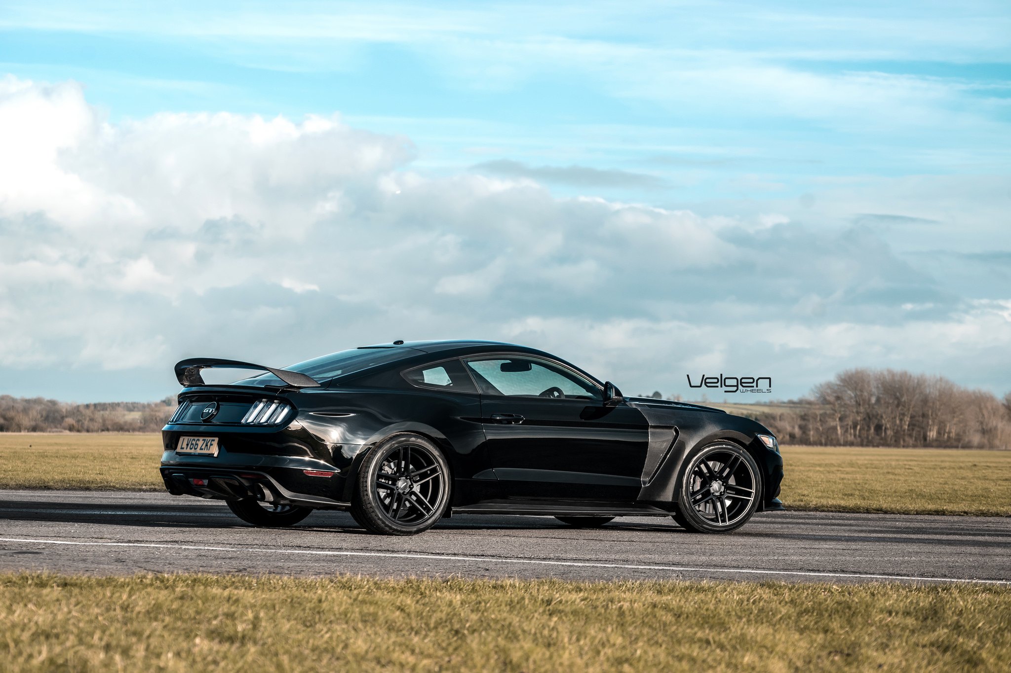 Black Ford Mustang with Custom Rear Spoiler - Photo by Velgen