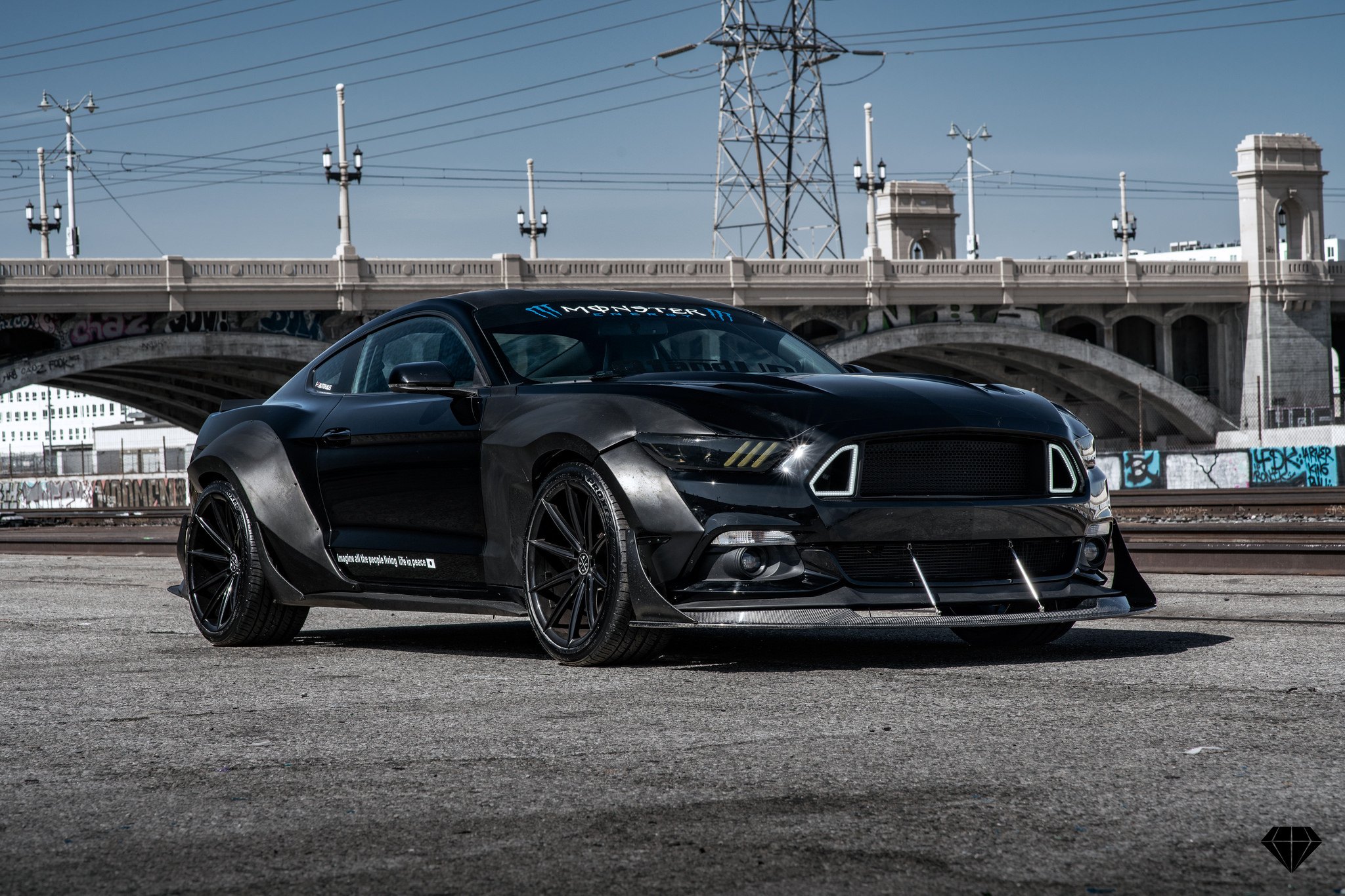 Carbon Fiber Front Lip on Black Ford Mustang - Photo by Blaque Diamond Wheels