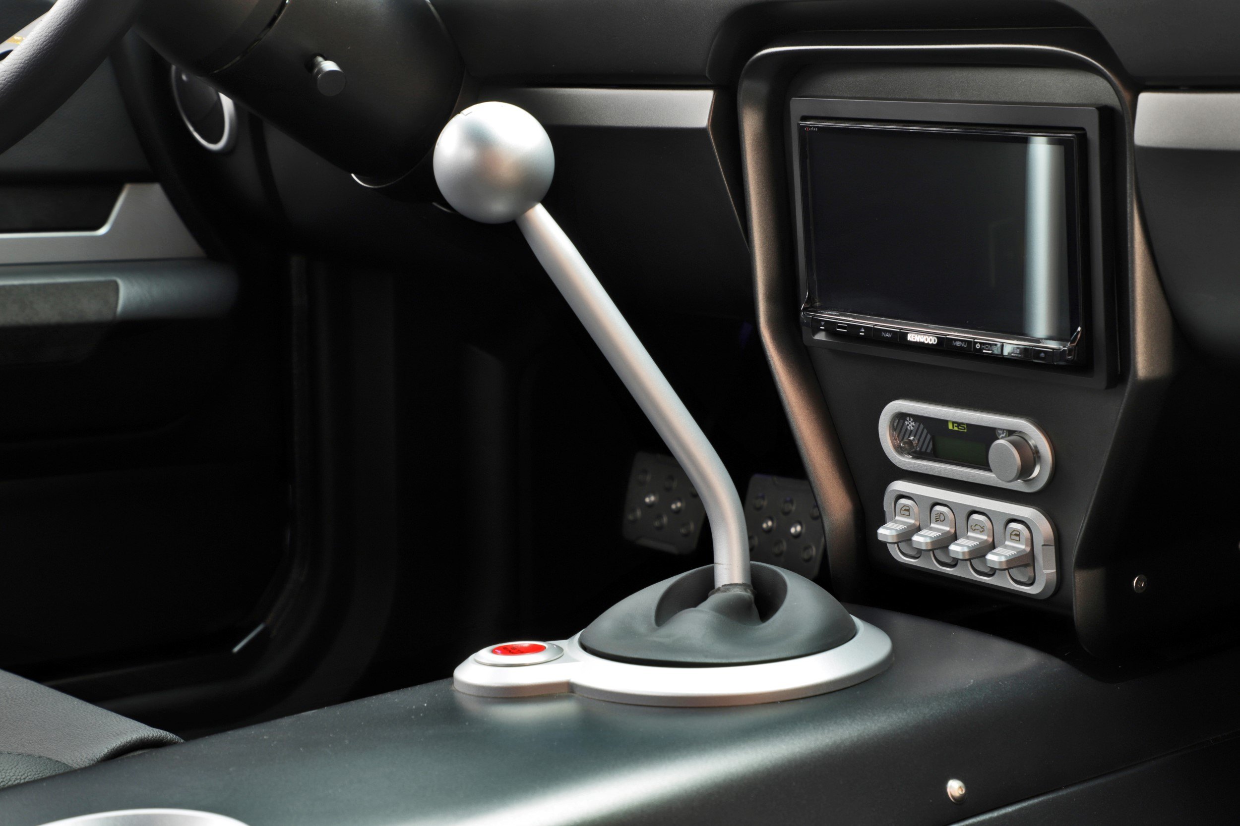 Custom Chrome Shift Knob in White Ford Mustang - Photo by Roadster Shop