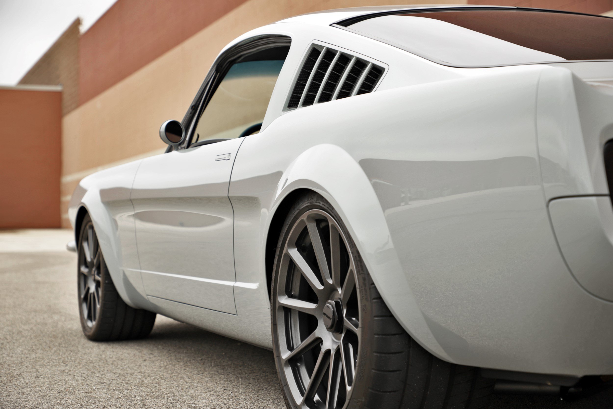 Gunmetal Rims on Custom White Ford Mustang - Photo by Roadster Shop