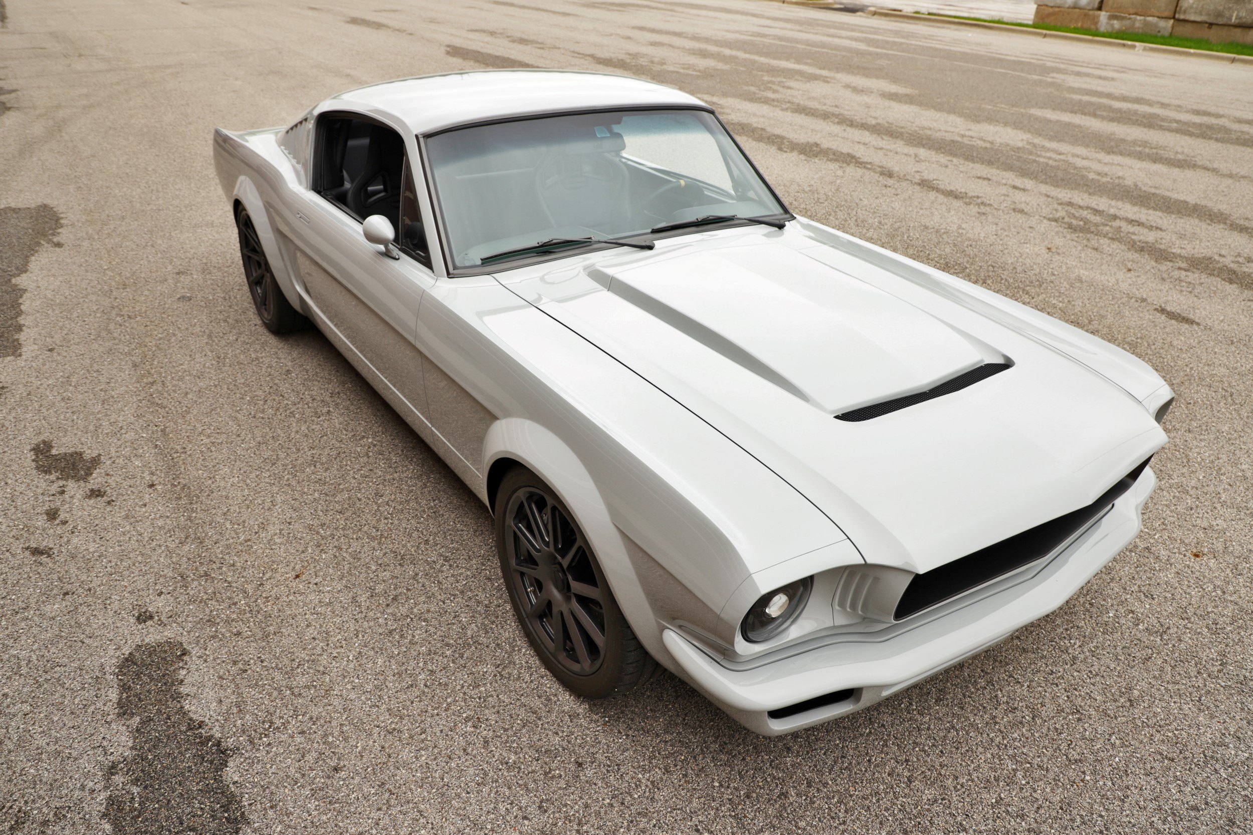 White Ford Mustang with Aftermarket Vented Hood - Photo by Roadster Shop