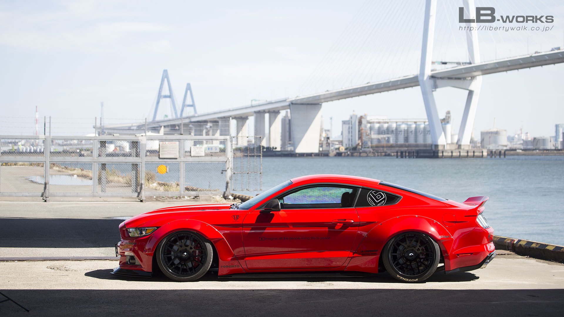 Red Ford Mustang with Aftermarket Fender Flares - Photo by LB Performance