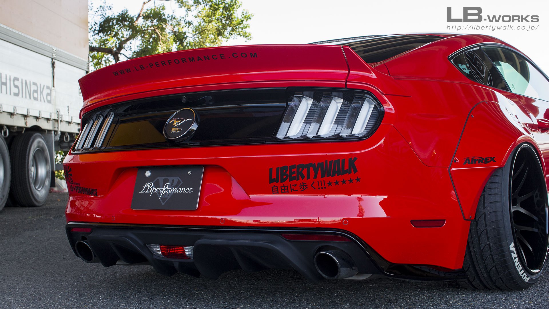 Red Ford Mustang with Aftermarket Rear Diffuser - Photo by LB Performance