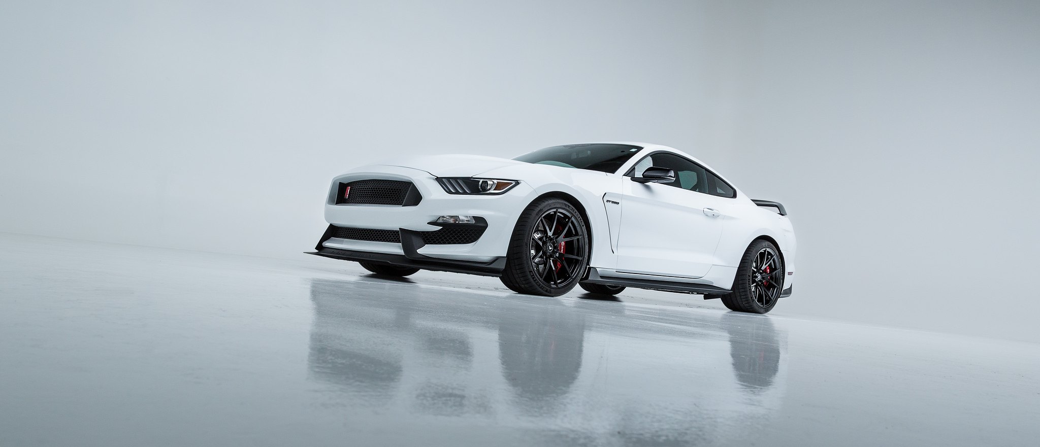 Blacked Out Mesh Grille on White Ford Mustang - Photo by Vorsteiner