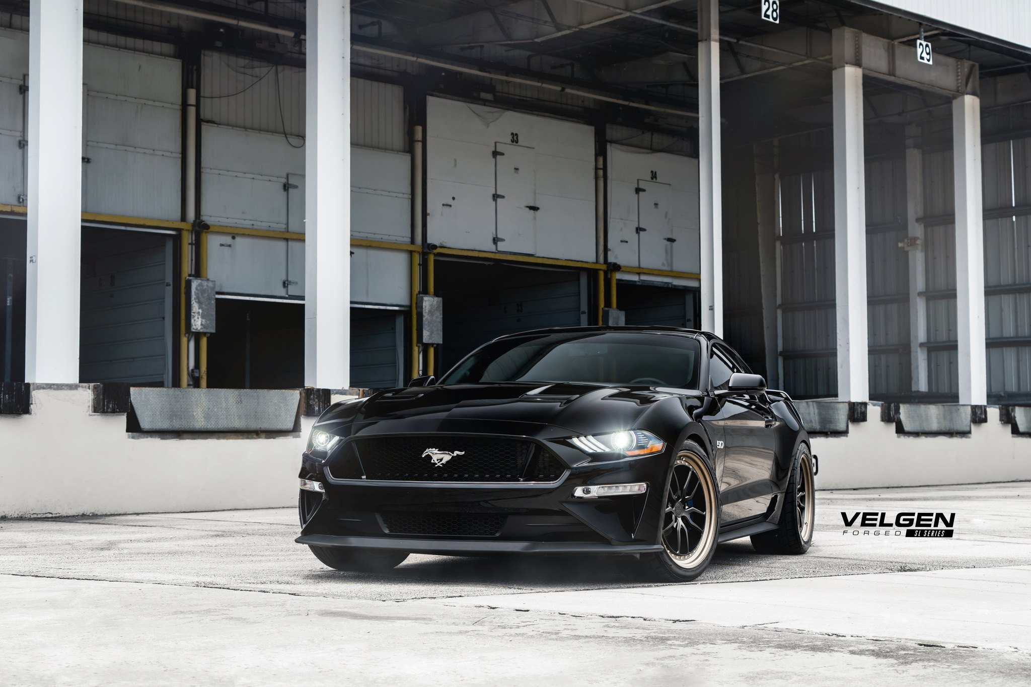 Black Ford Mustang 5.0 with Custom Projector Headlights - Photo by Velgen Wheels