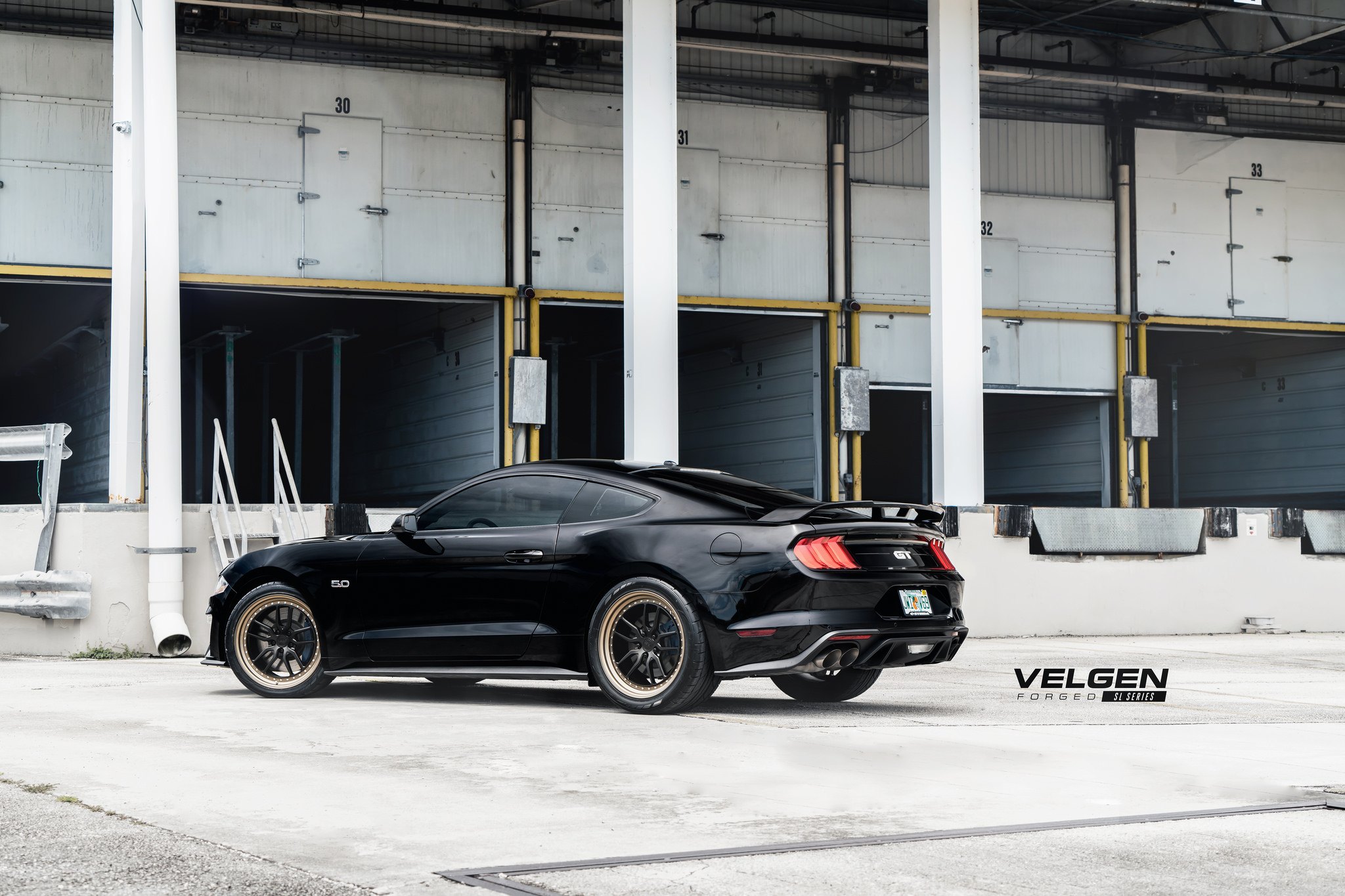 Aftermarket Rear Diffuser on Black Ford Mustang GT - Photo by Velgen Wheels
