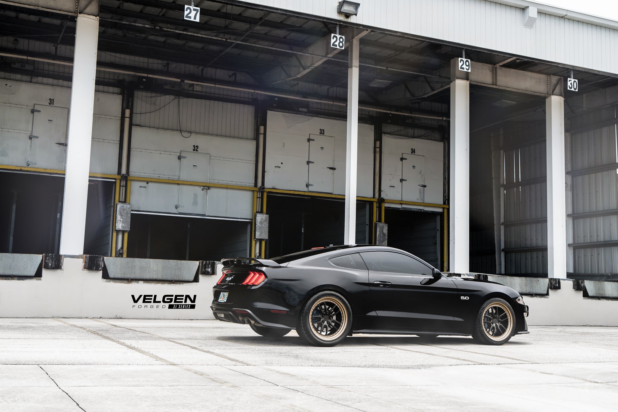 Black Ford Mustang GT with Custom Style Rear Spoiler - Photo by Velgen Wheels