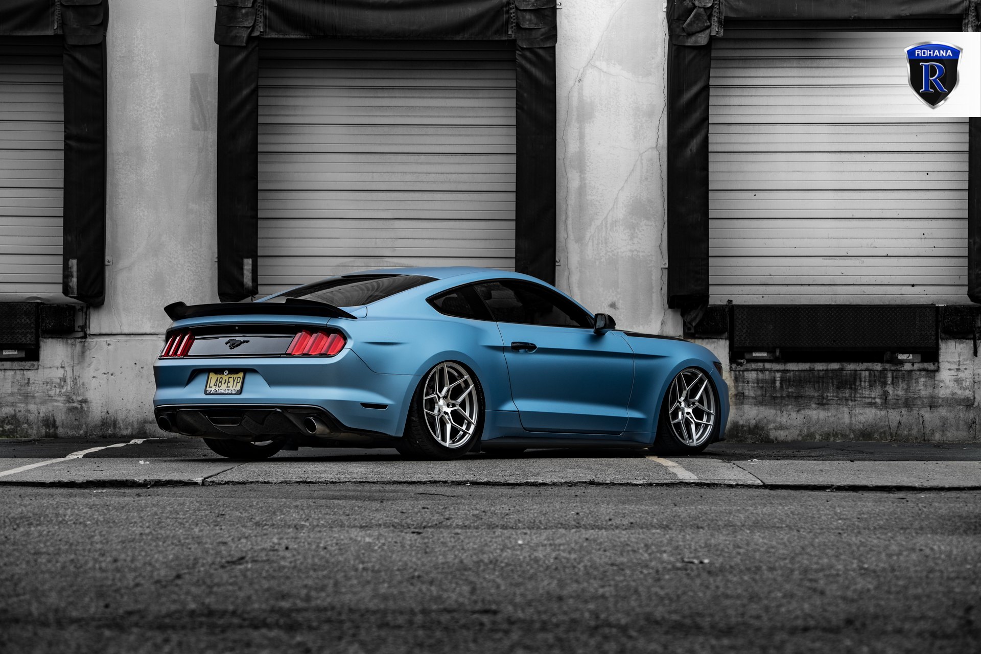 Blue Ford Mustang with Aftermarket Rear Spoiler - Photo by Rohana Wheels