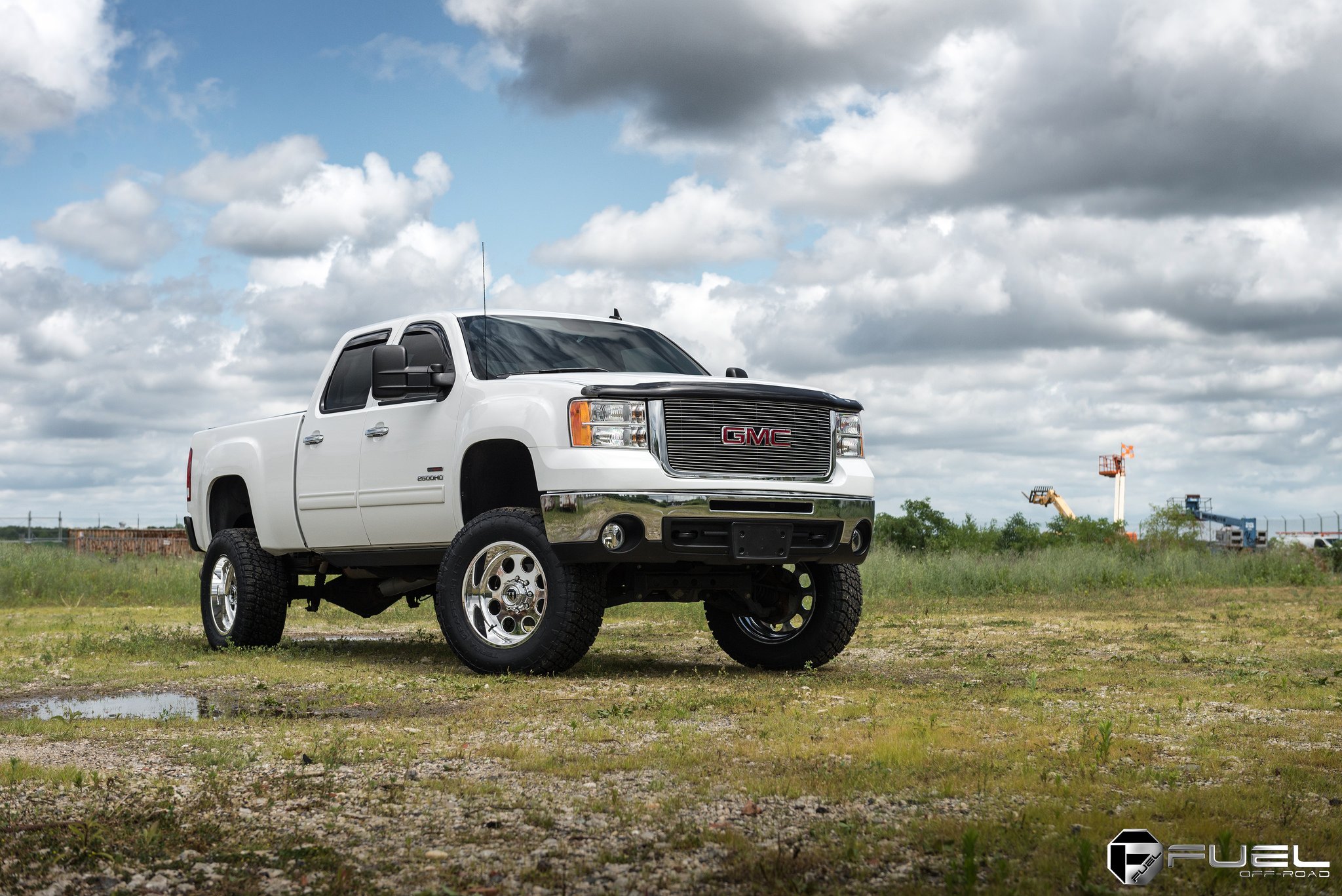 White GMC Sierra with Chrome Billet Grille - Photo by Fuel Offroad