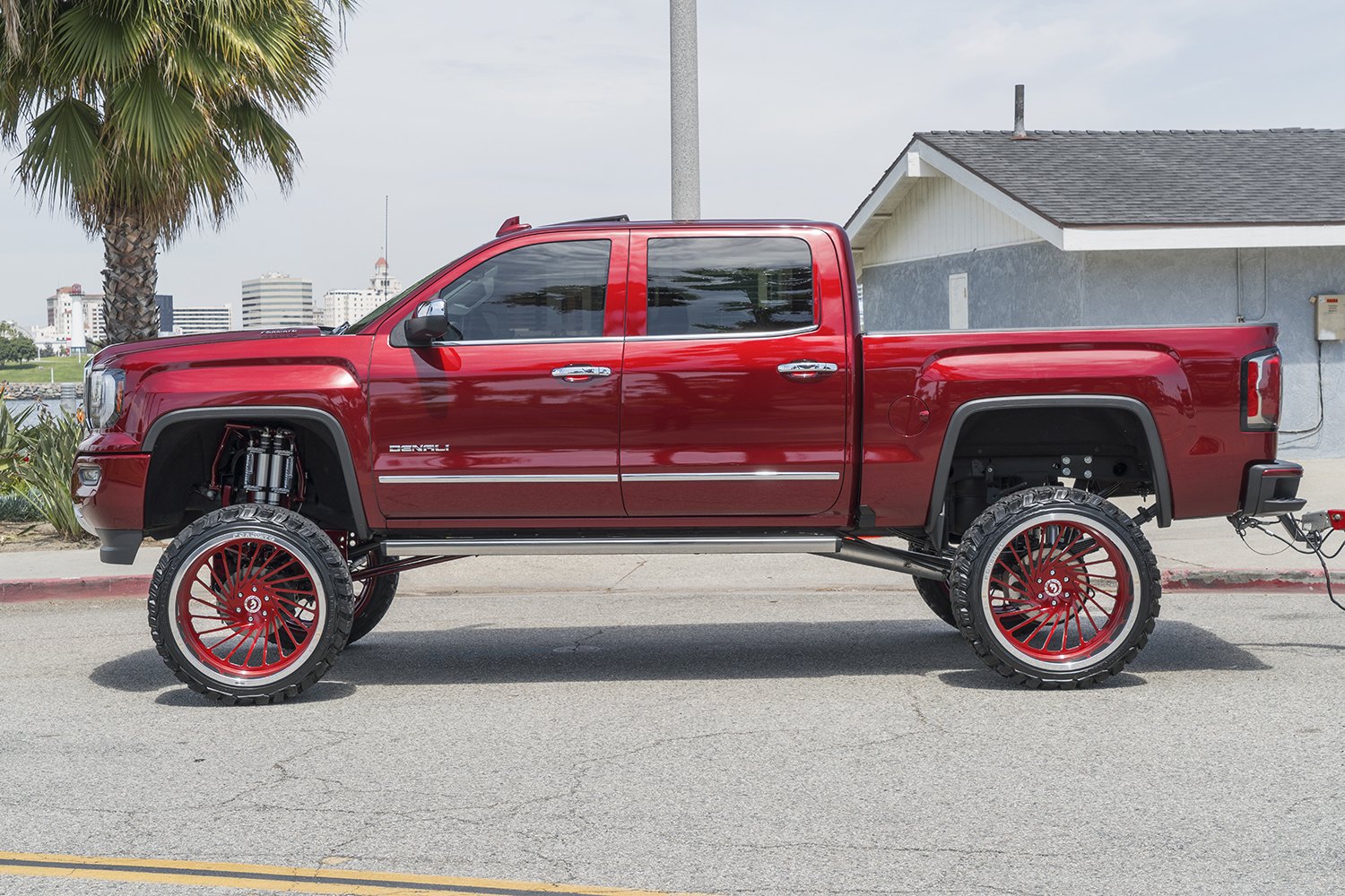 Red GMC Sierra Denali with Aftermarket Running Boards - Photo by Forgiato
