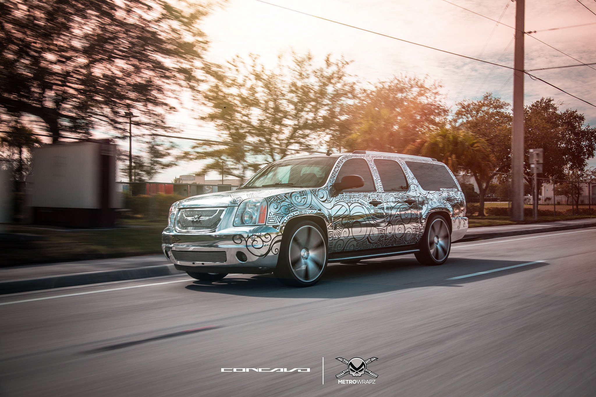 Tattooed GMC Yukon With a Chrome Wrap and Concavo Rims - Photo by Concavo