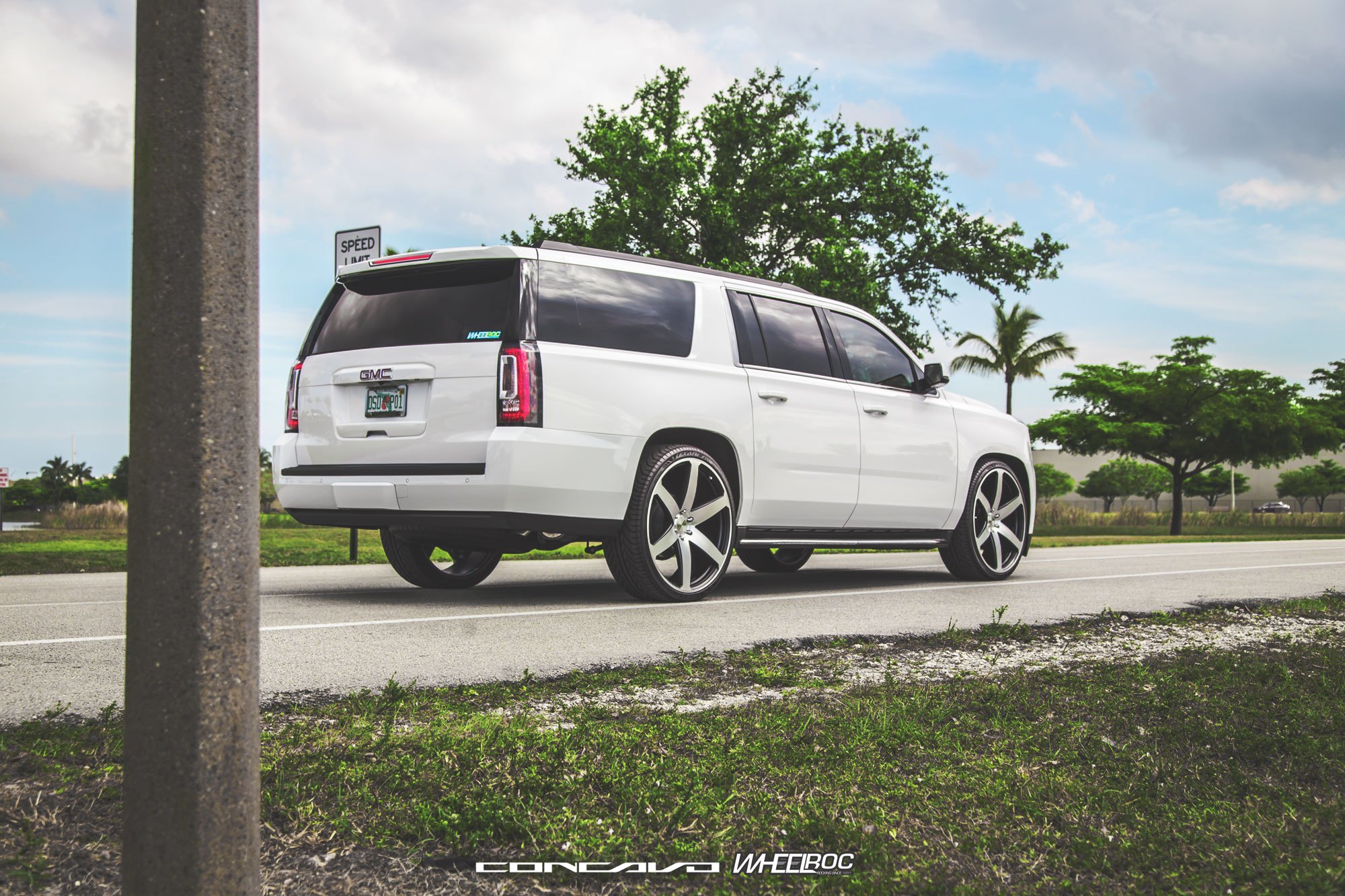 White GMC Yukon XL With Lowered Suspension - Photo by Concavo