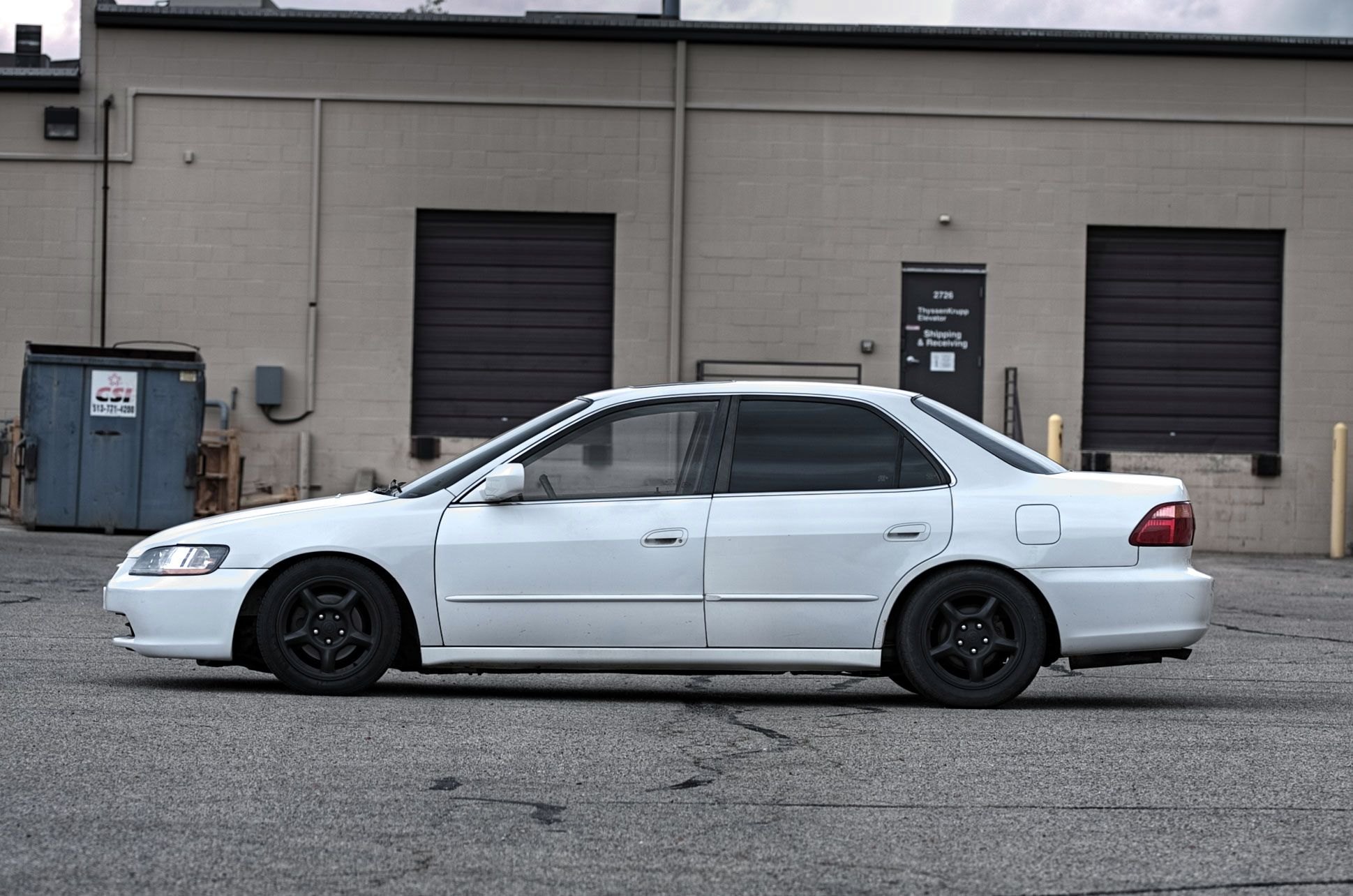 White Honda Accord with Aftermarket Side Skirts - Photo by dan kinzie