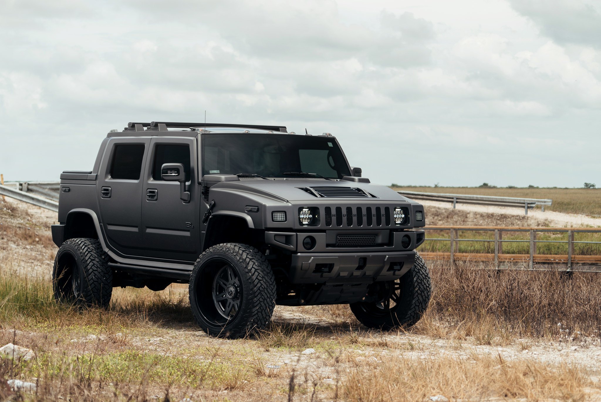 Mean-looking Hummer H2 SUT With a Lift and Fuel Off-road Wheels — CARiD.com  Gallery