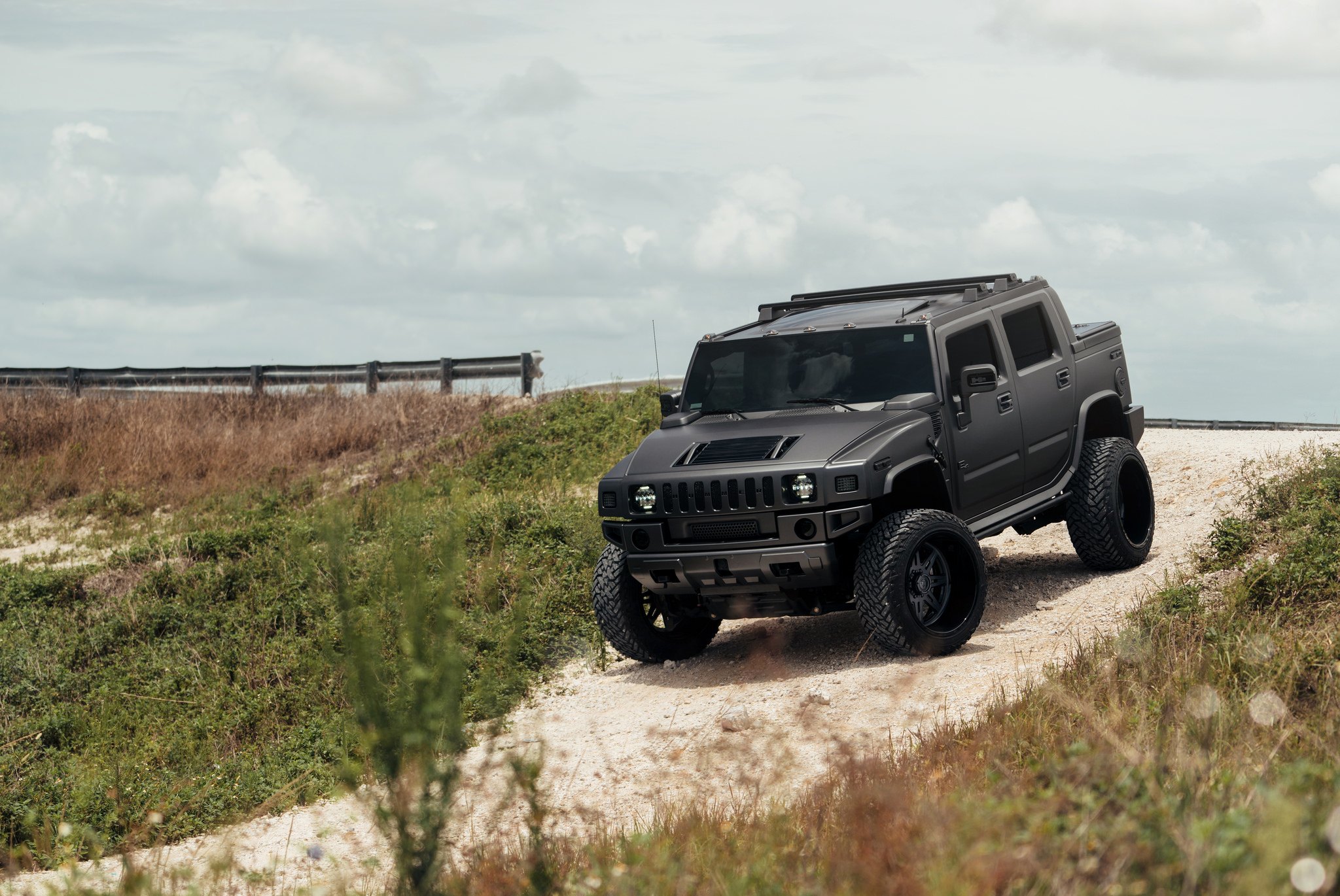 24 Inch Fuel Offroad Rims on Black Matte Hummer H2 - Photo by Fuel Offroad