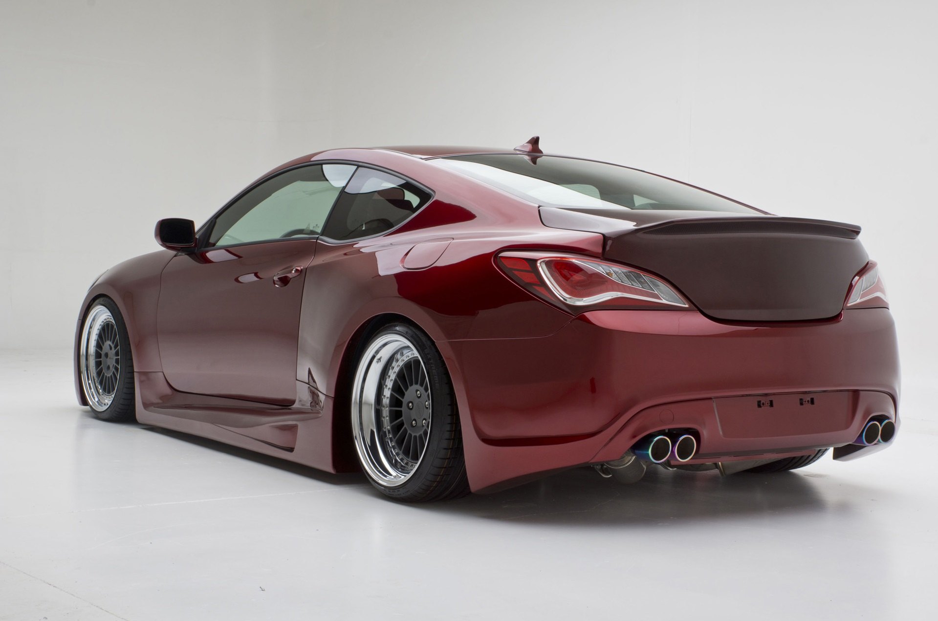 Red Hyundai Genesis Coupe with Aftermarket Rear Diffuser - Photo by Eddie Phạm
