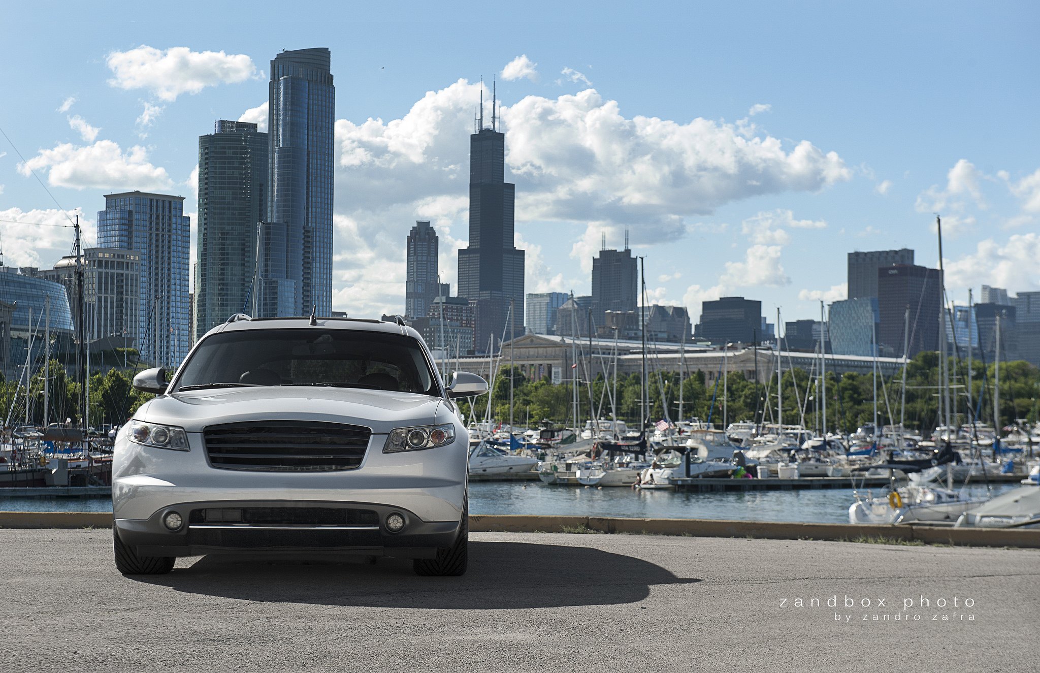 Silver Infiniti FX45 with Blacked Out Billet Grille - Photo by zandbox