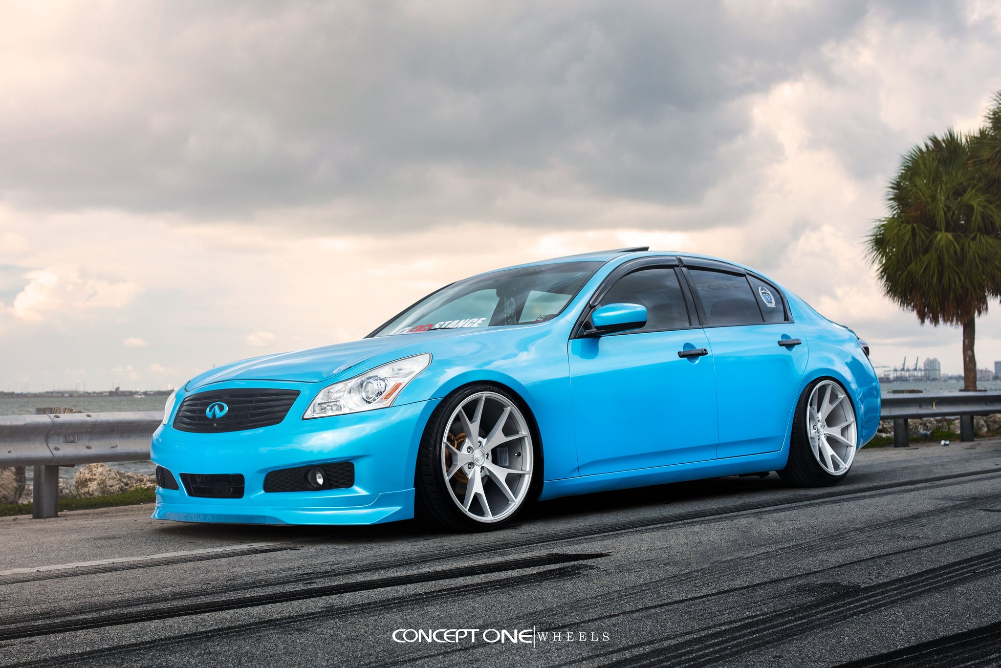 Blue Infiniti G35 with Aftermarket Front Bumper - Photo by Concept One