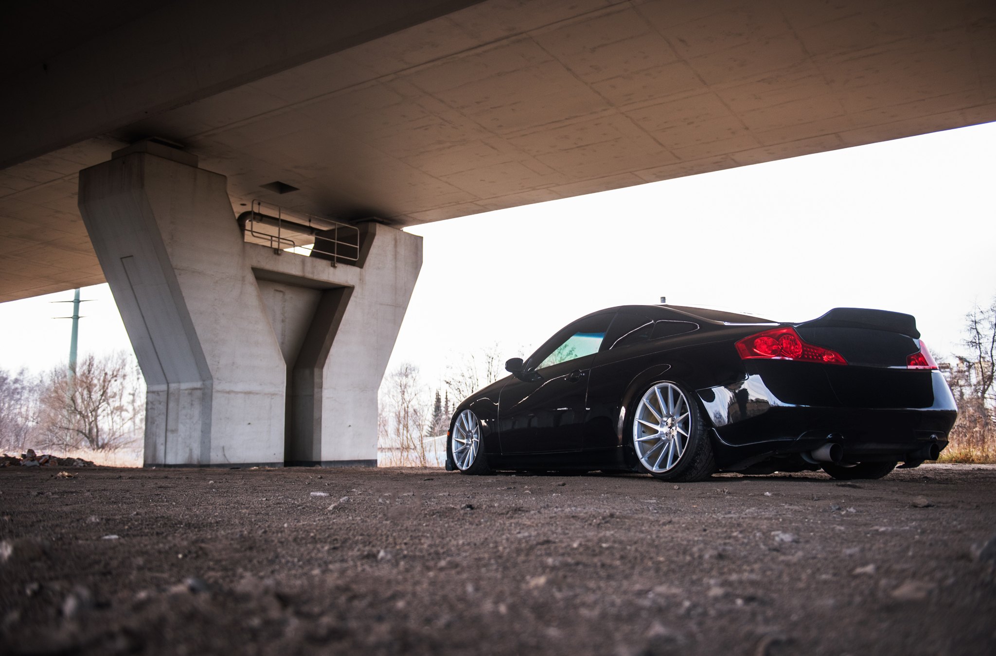 Black Stanced Infiniti G35 with Aftermarket Rear Spoiler - Photo by JR Wheels
