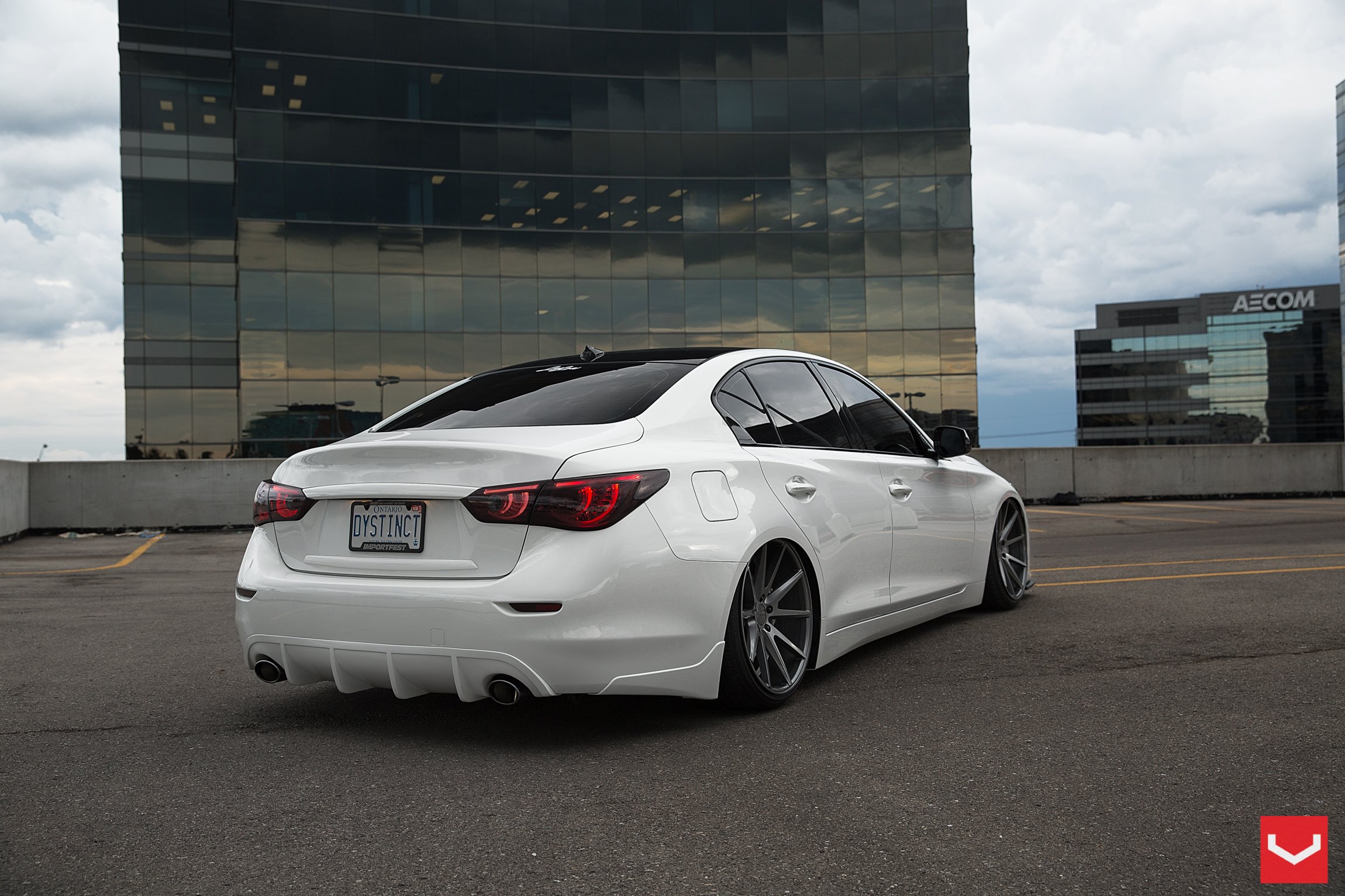 Aftermarket Rear Diffuser on White Infiniti Q50 - Photo by Vossen