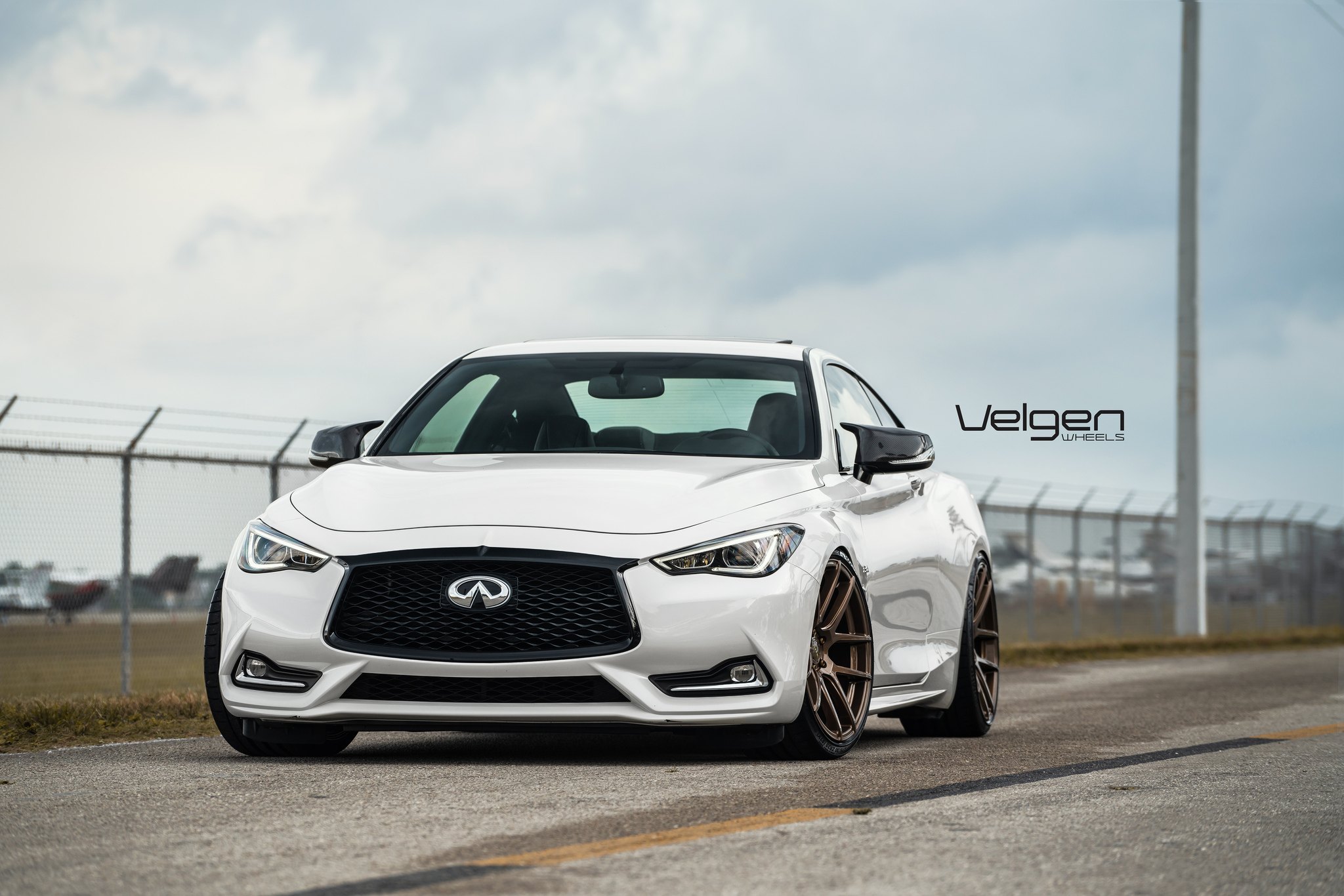 White Infiniti Q60 with Blacked Out Mesh Grille - Photo by Velgen Wheels