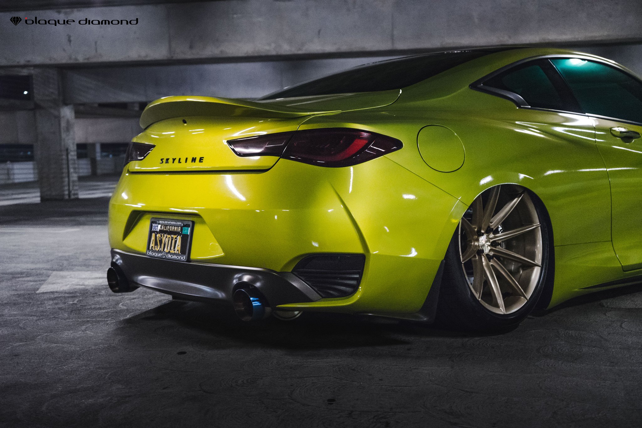Yellow Infiniti Q60 with Aftermarket Rear Diffuser - Photo by Blaque Diamond Wheels