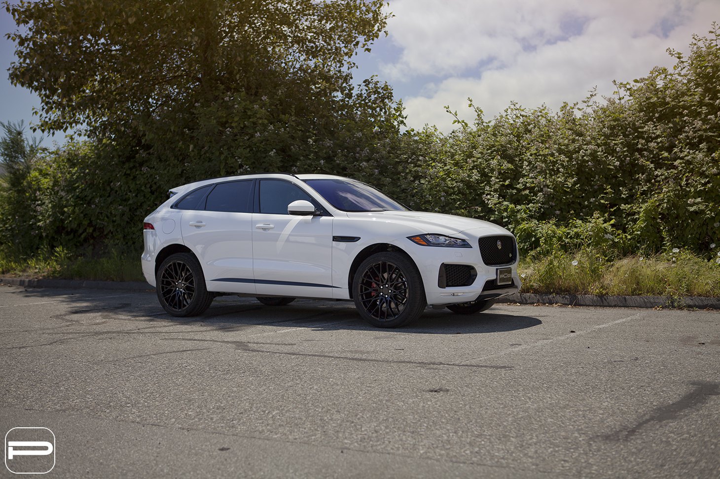 White Jaguar F-Pace with Aftermarket Headlights - Photo by PUR Wheels