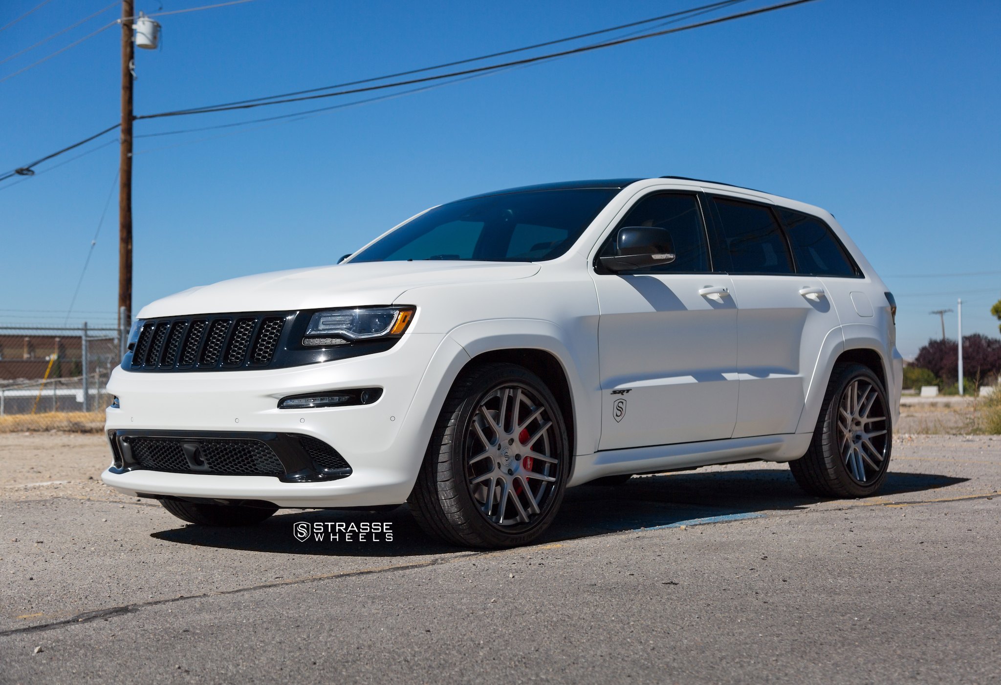 White Jeep Grand Cherokee with Custom Headlights - Photo by Strasse Forged