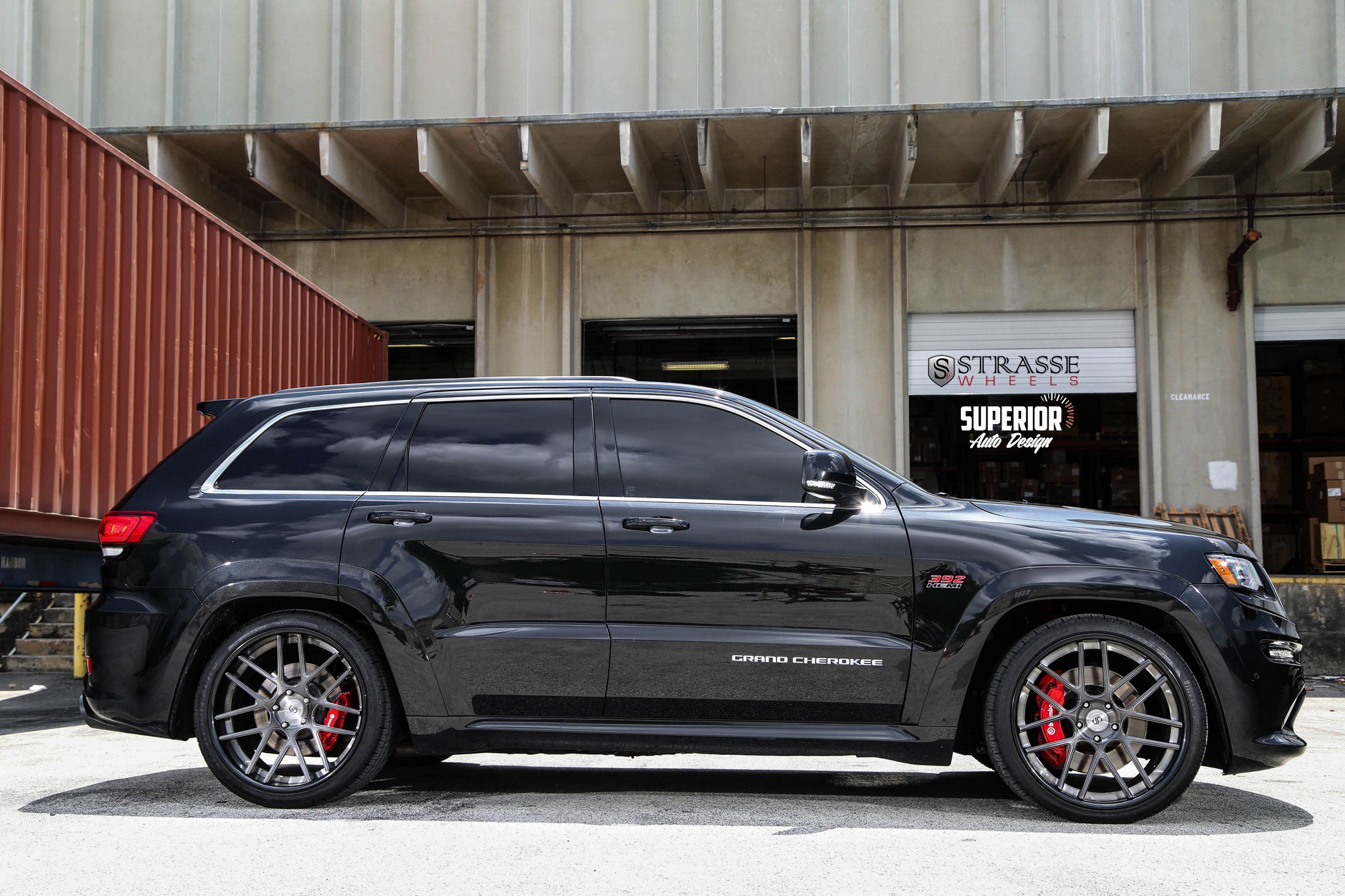 Custom Black Jeep Grand Cherokee Side Skirts - Photo by Strasse Forged