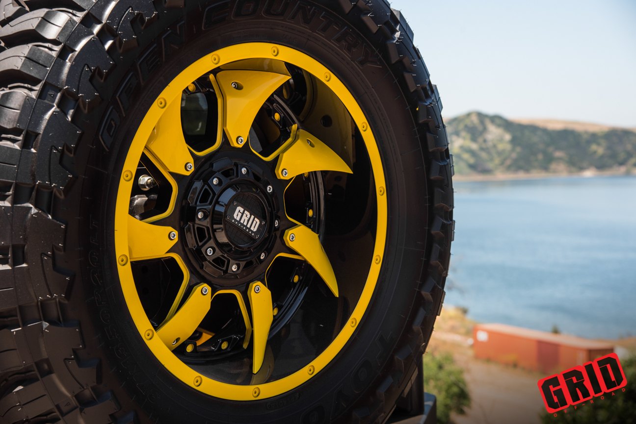 Grid Off-Road Wheels on Yellow Lifted Jeep Wrangler - Photo by Grid Off-Road