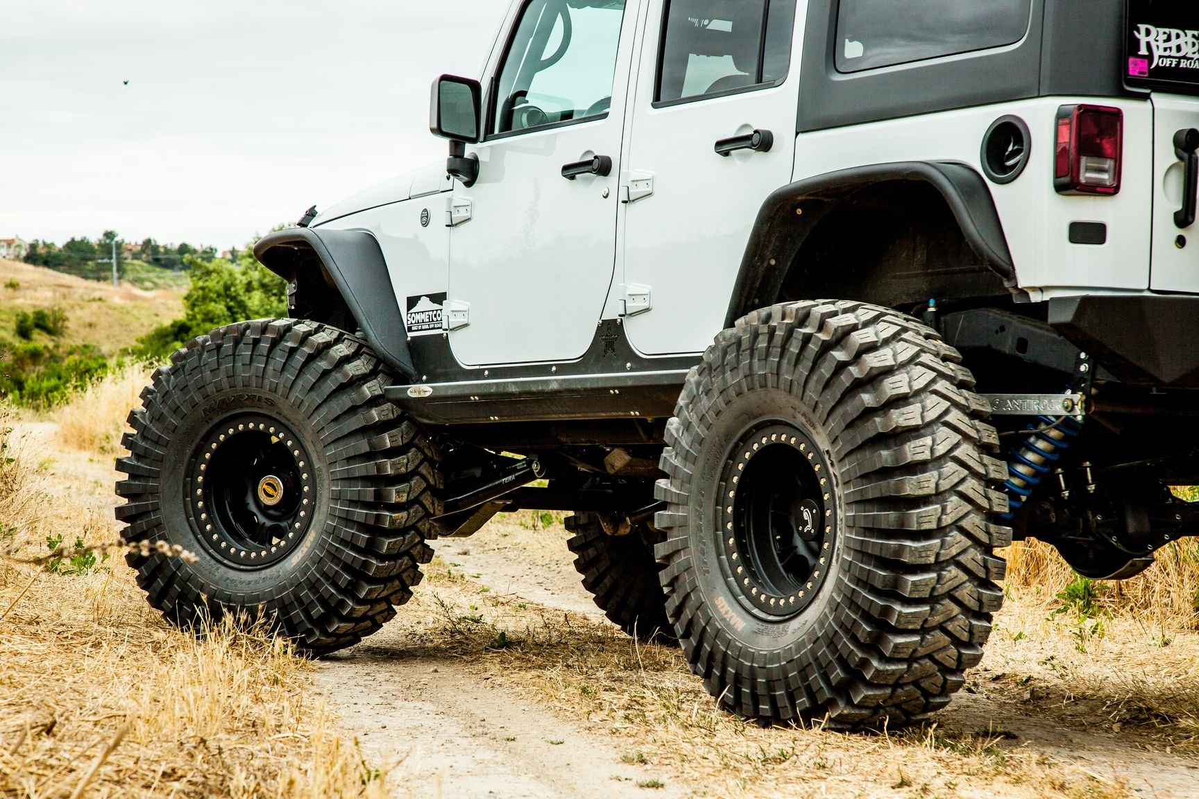 White Lifted Jeep Wrangler with Aftermarket Fender Flares - Photo by Rebel Off-Road