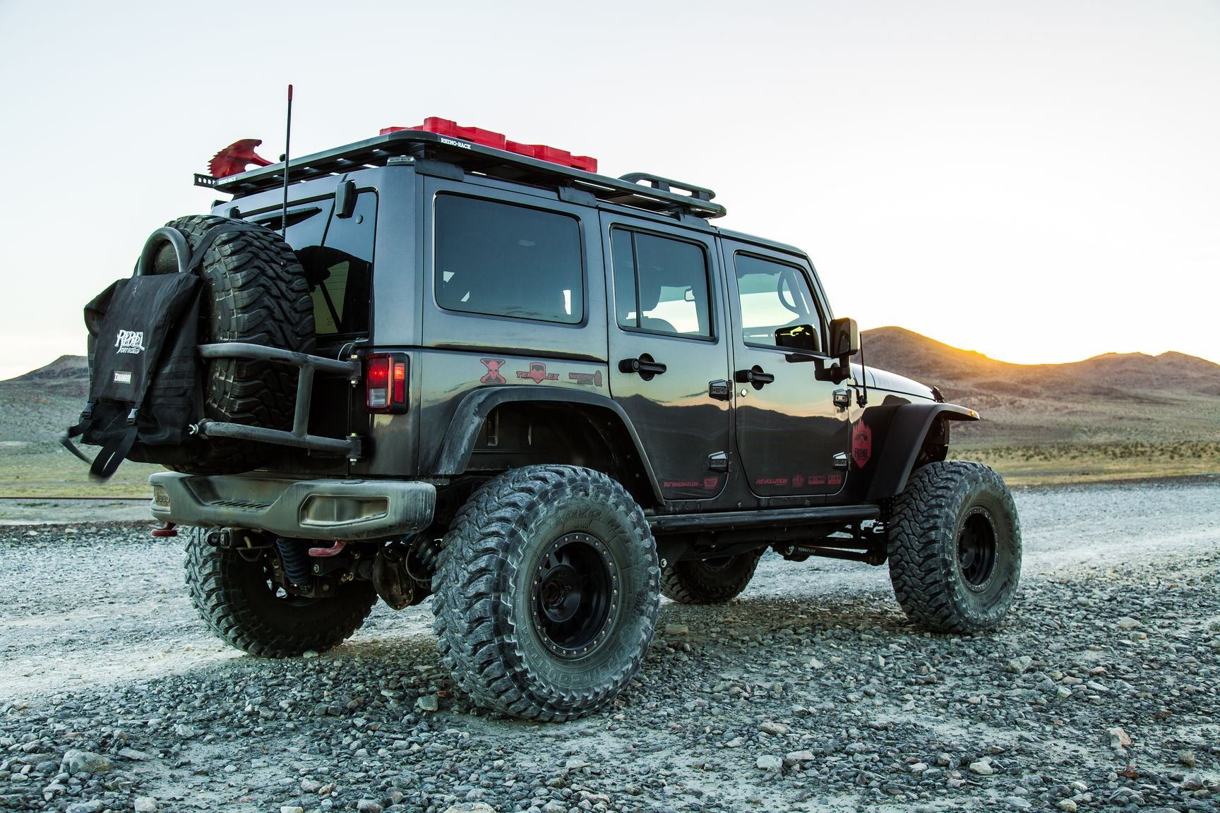 Black Lifted Jeep Wrangler Customized for Active Lifestyle Carrying Rhino  Rack Bike Rack —  Gallery