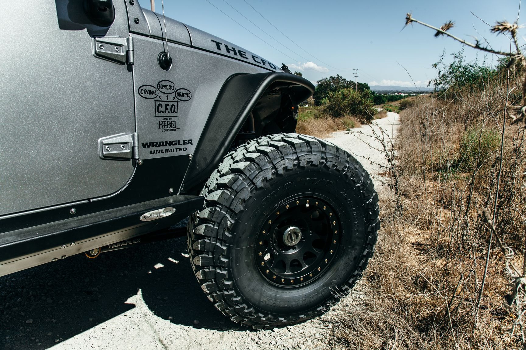Toyo Open Country Tires on Gray Lifted Jeep Wrangler - Photo by Rebel Off-Road