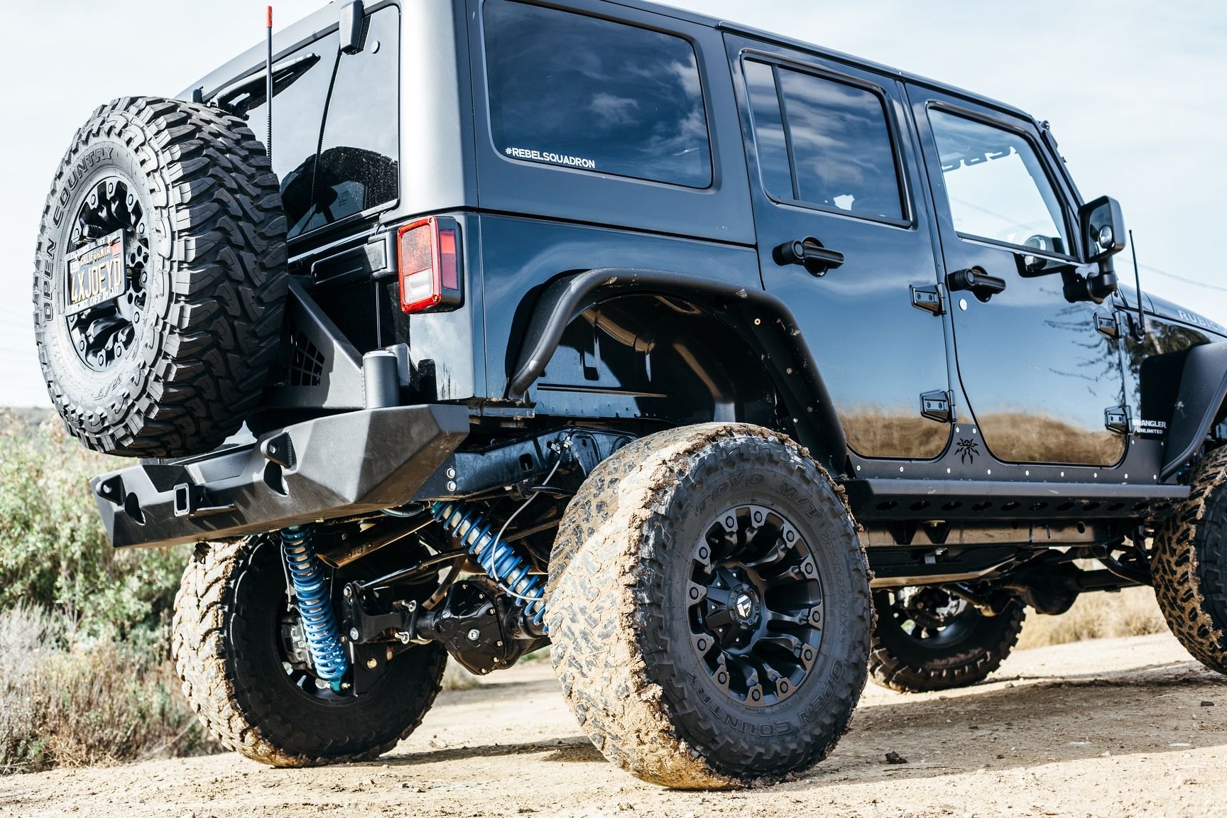 Off-Road Rear Bumper on Black Lifted Jeep Wrangler - Photo by Rebel Off-Road