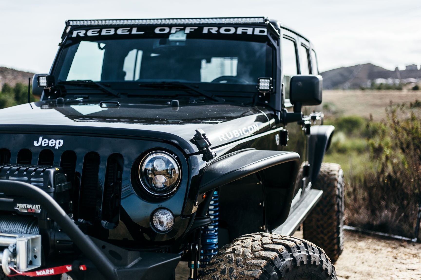 Off-Road LED Light Bar on Black Lifted Jeep Wrangler - Photo by Rebel Off-Road
