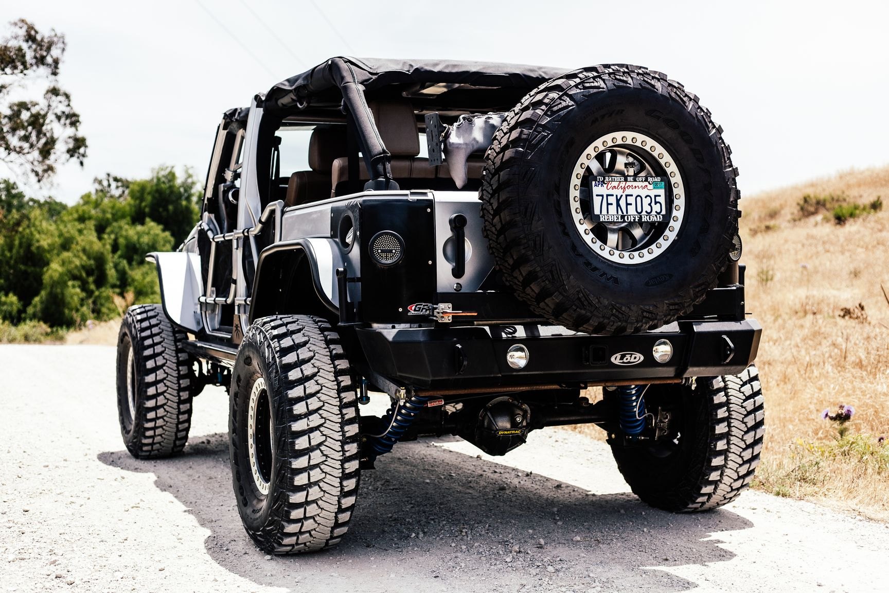 Gray Lifted Jeep Wrangler with Custom Dynatrac Brake Kit - Photo by Rebel Off-Road